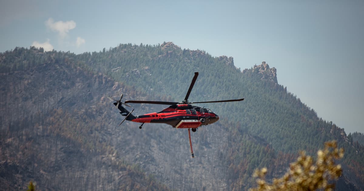 Mobile 'dip site' supplies water for helicopters to help fight the Aspen Acres fire