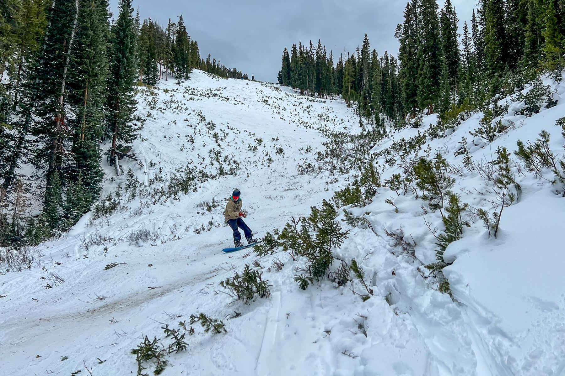 A skier moves through snow