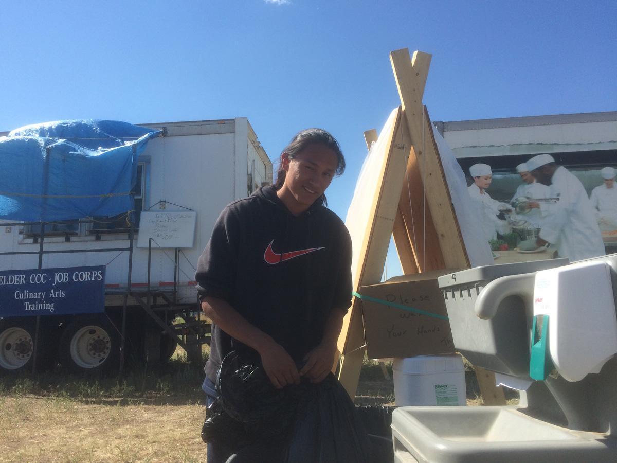 Deavontay Small Bear of Mission, South Dakota is among the Job Corps students working to support the Hayden Pass Fire base camp.