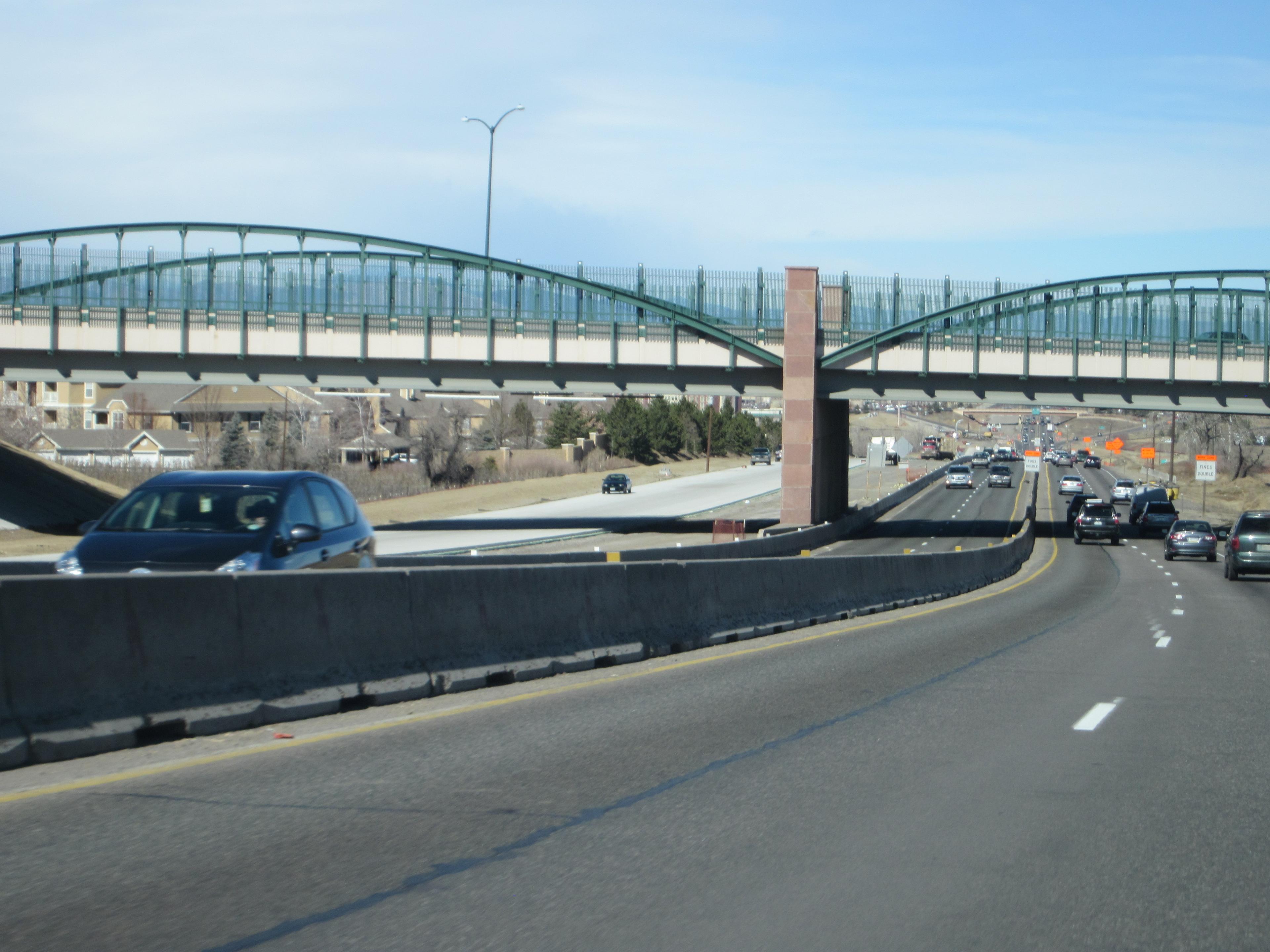 Traffic travels under a bridge along U.S. Highway 36.