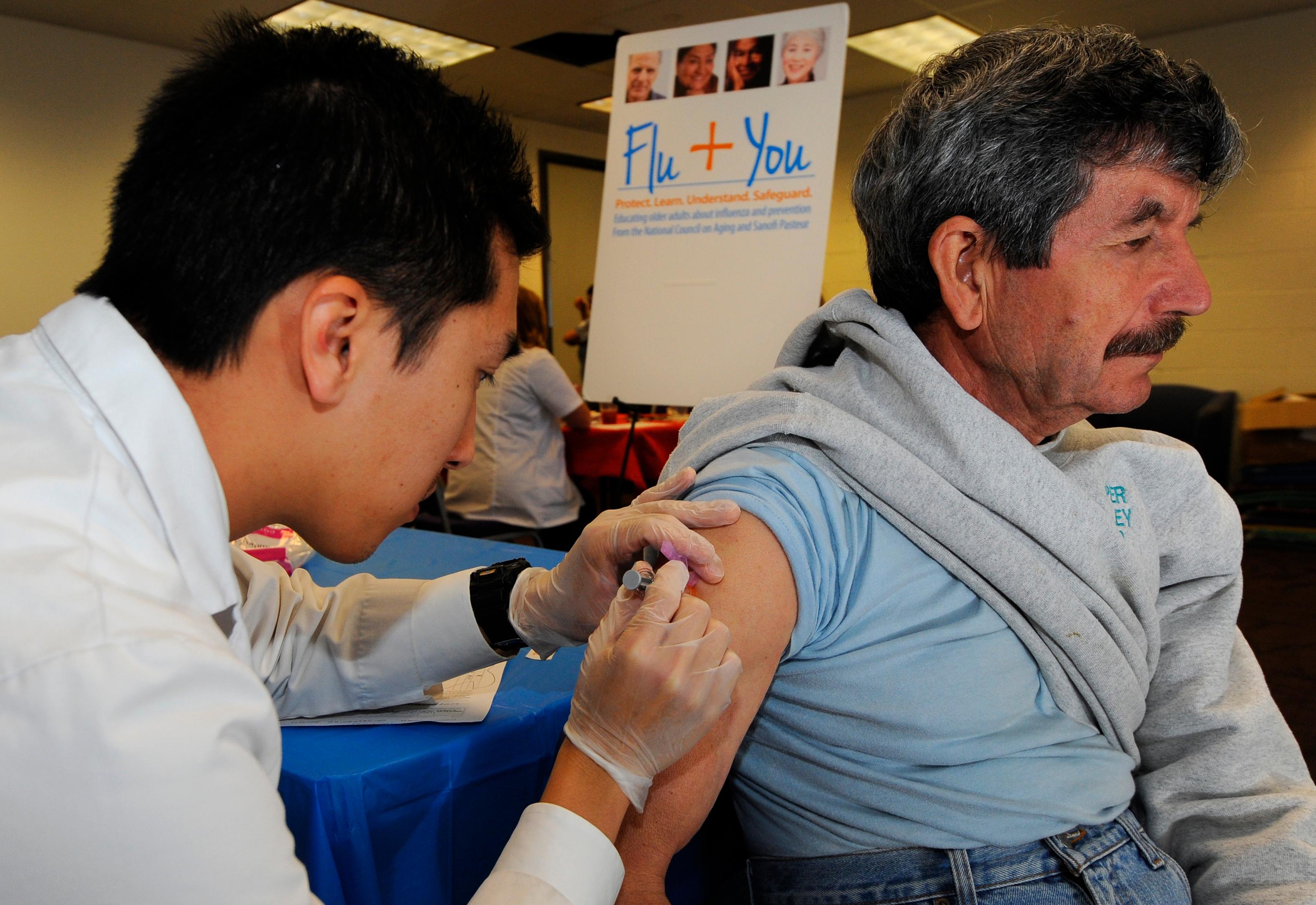 Photo: Flu shot (AP Photo)