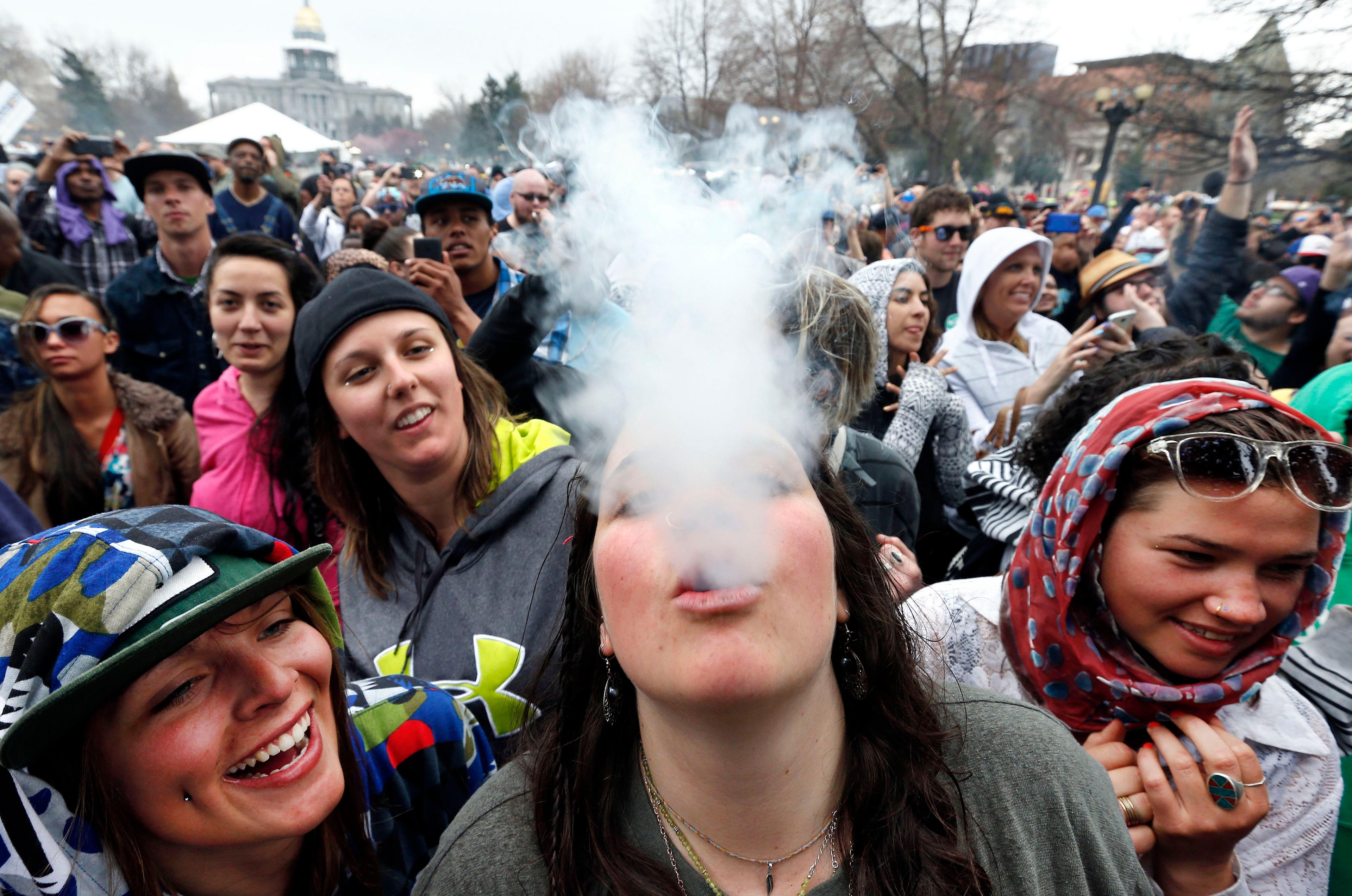 Photo: Smoking marijuana in public (AP Photo)