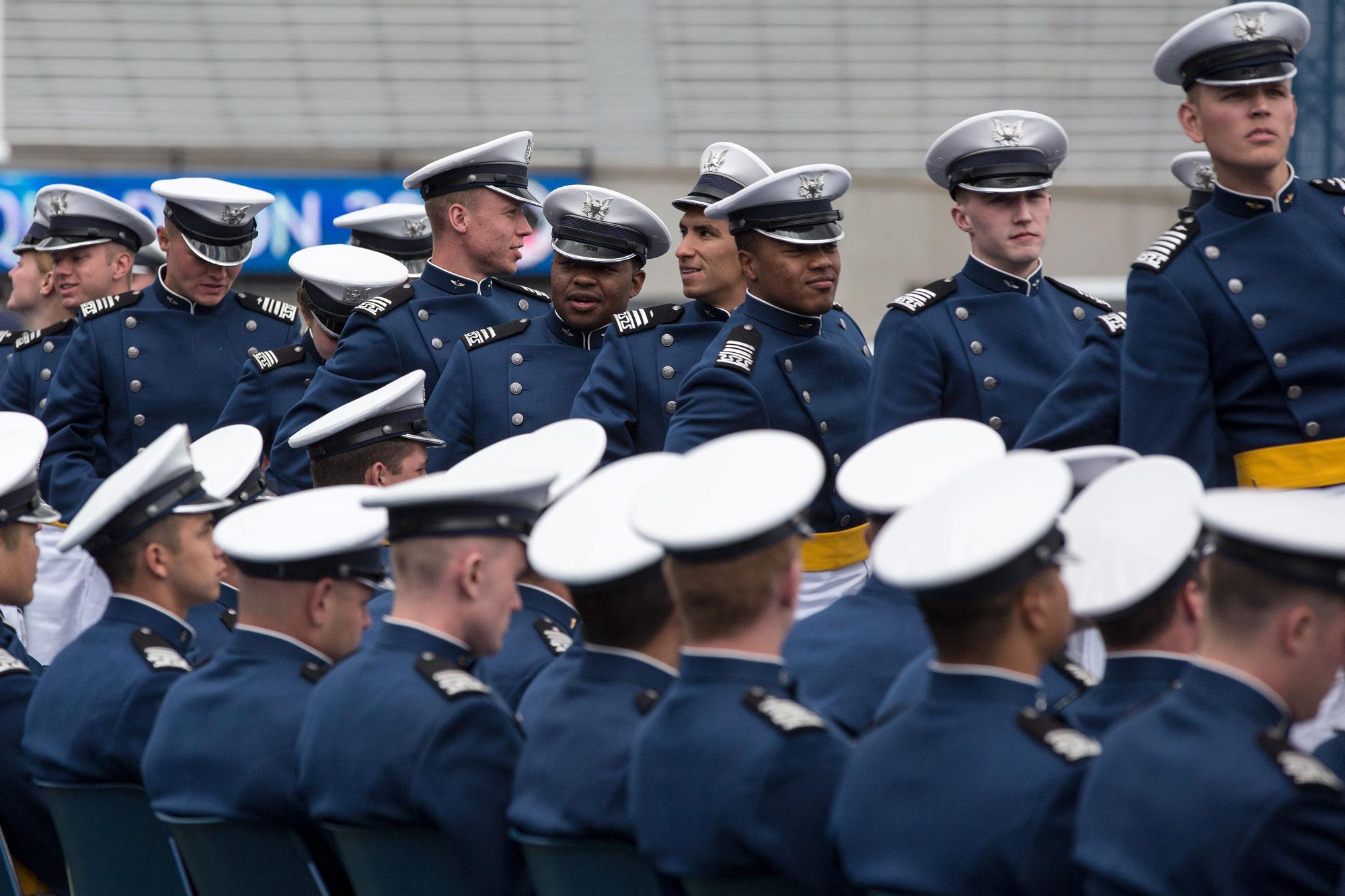 U.S. Air Force Academy graduates line up to collect their diplomas