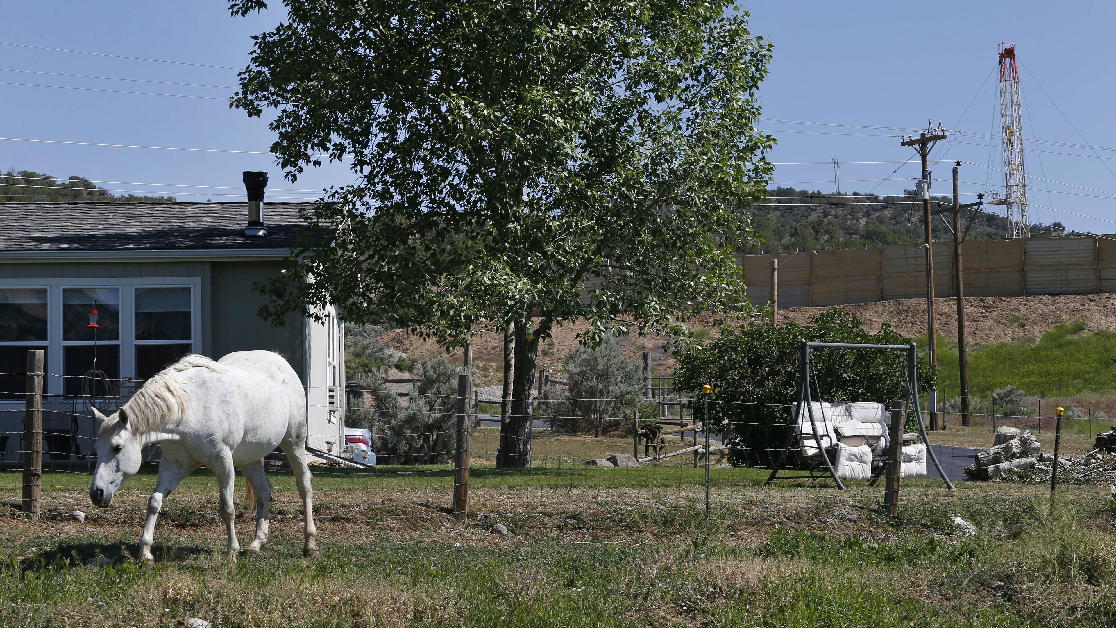 Photo: Oil and gas rig near home (AP Photo)