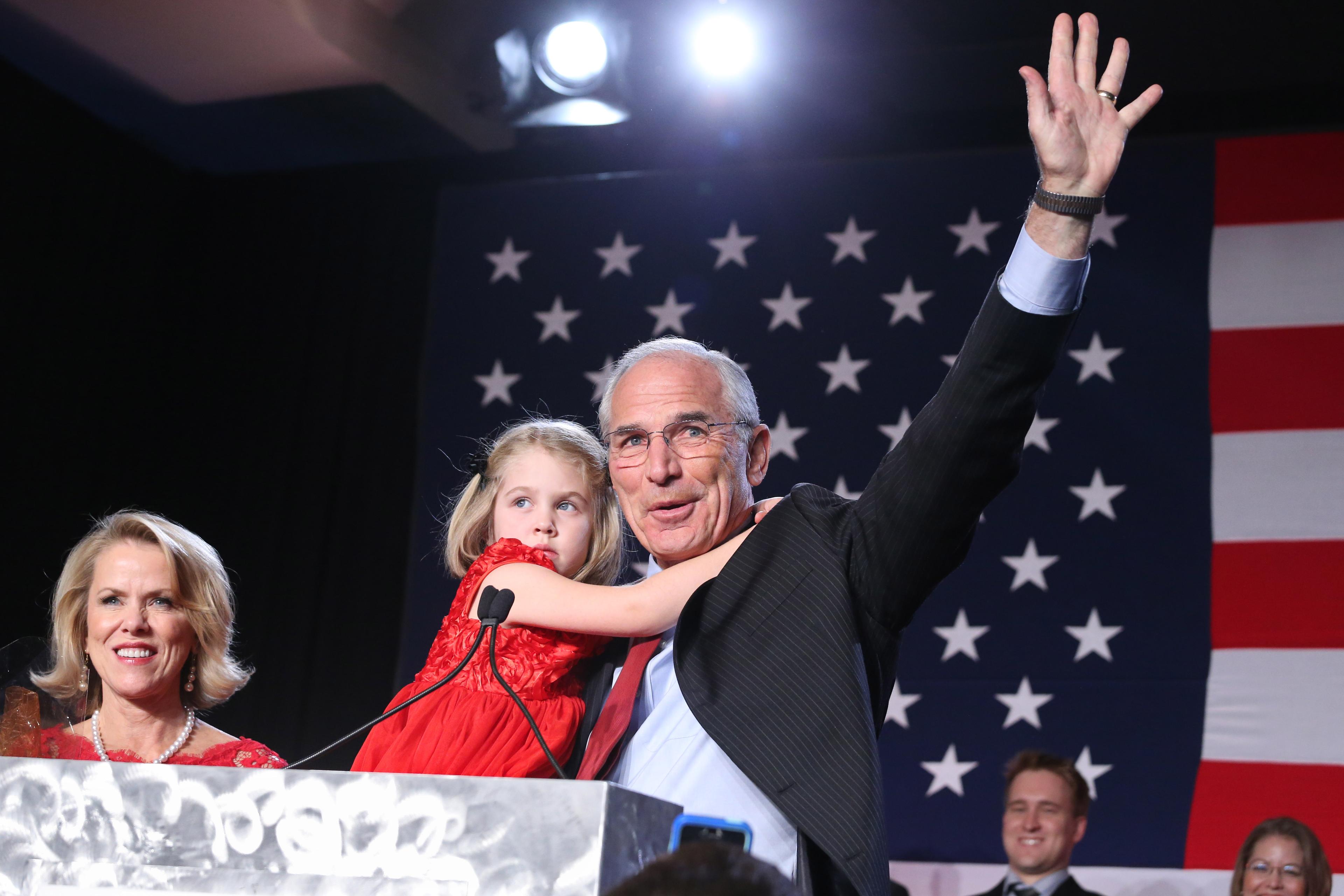 Photo: Bob Beauprez waves on Election Night (AP Photo)