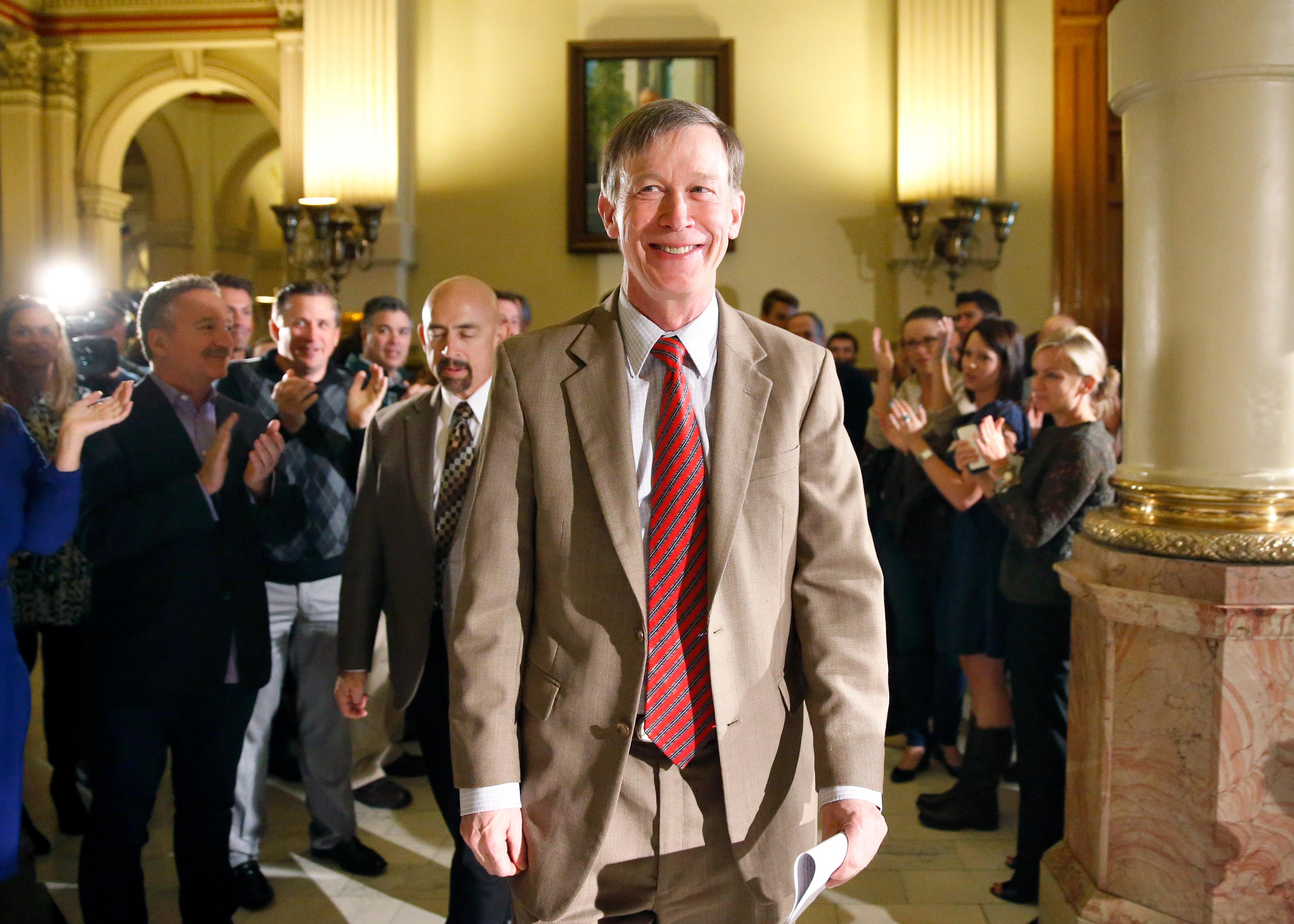 Photo: Colorado Gov. John Hickenlooper gives victory speech (AP Photo)