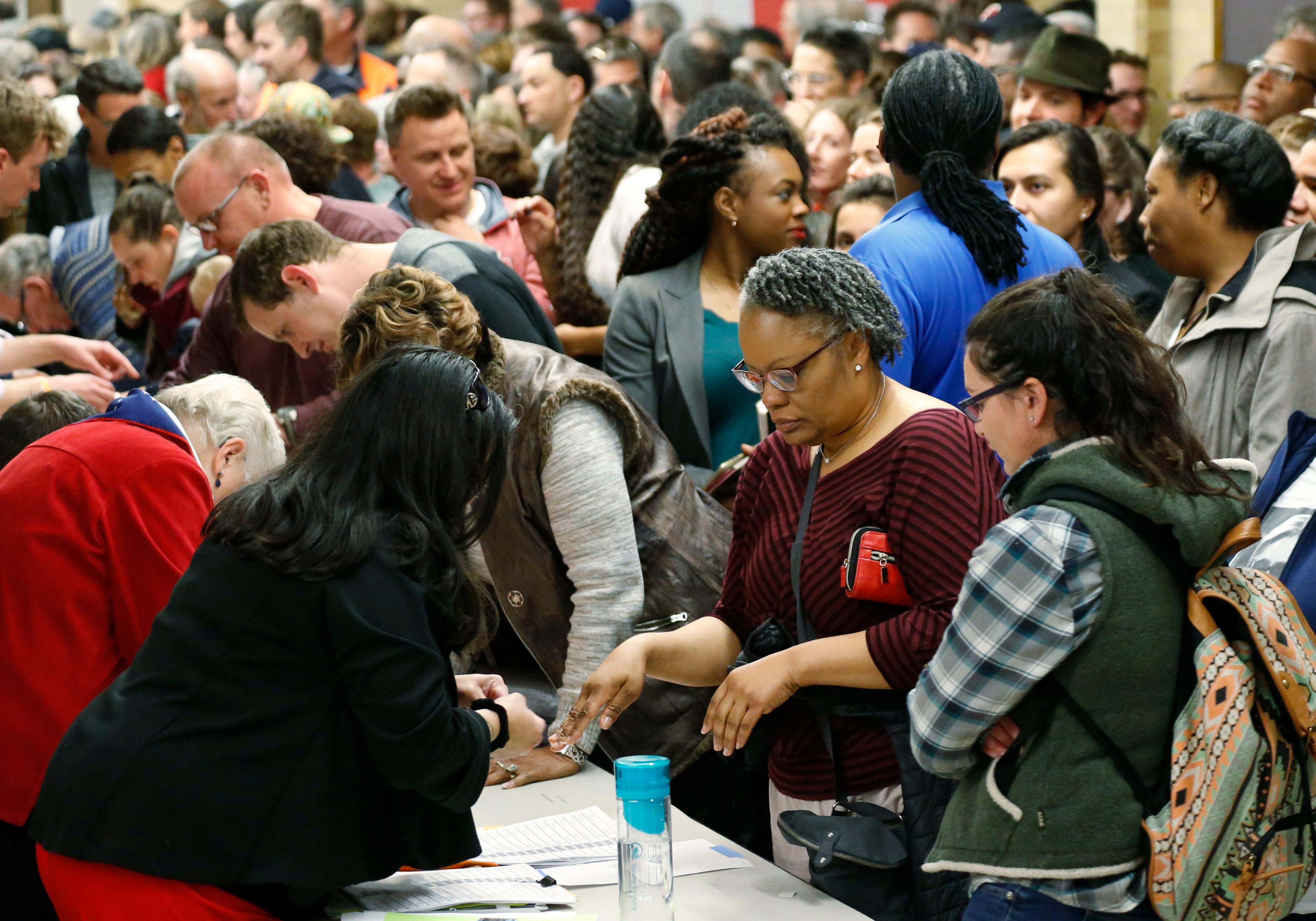 Photo: Democratic Caucus in Denver March 2016 (AP Photo)