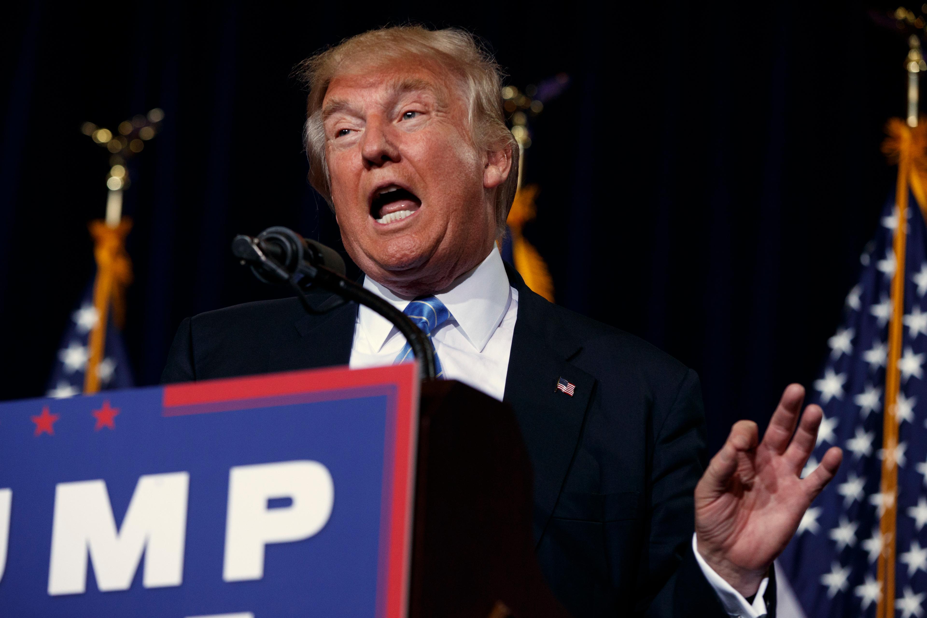 Photo: Trump in Phoenix giving immigration speech (AP Photo)