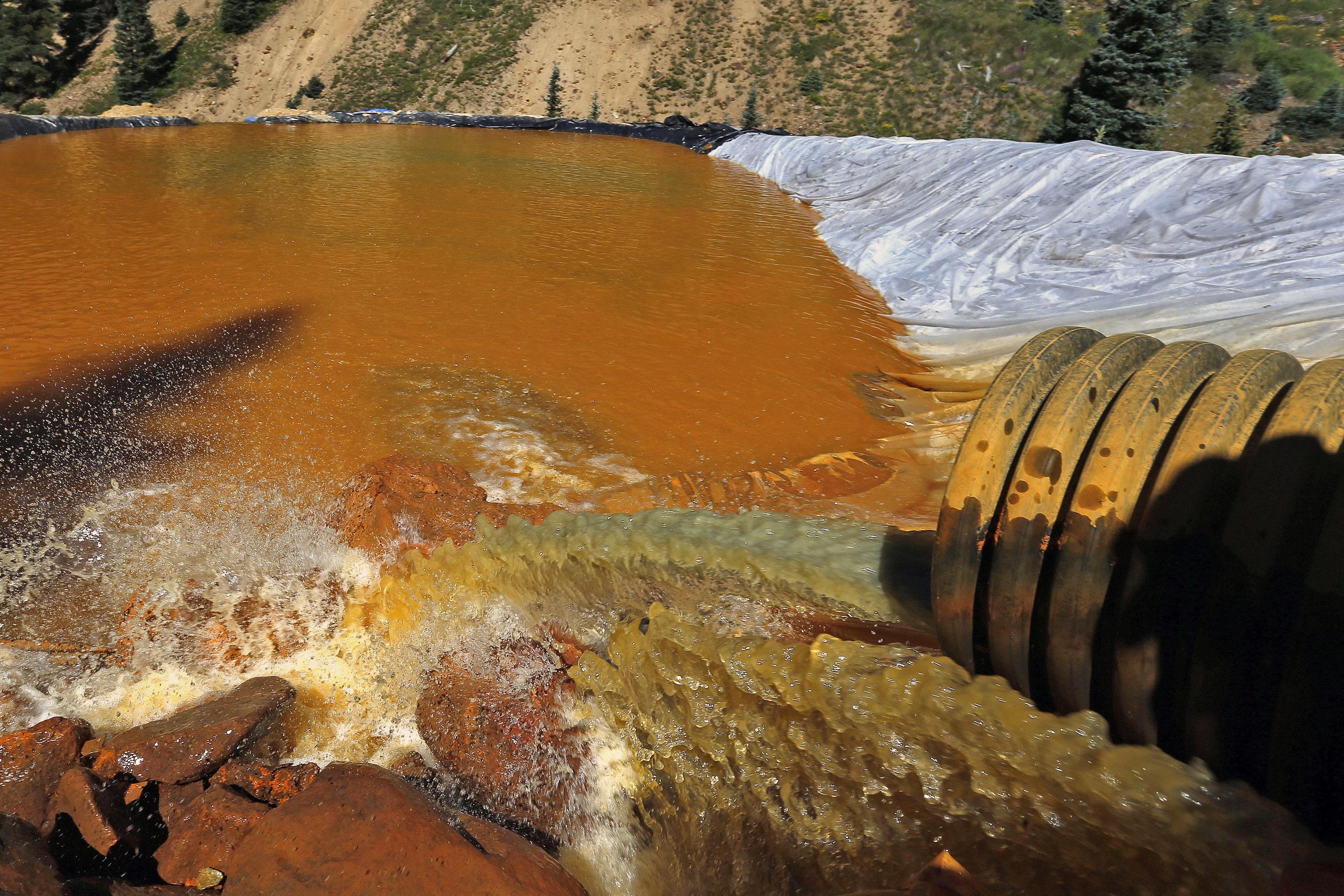 Photo: Gold King Mine Spill | Water Retention Pond - AP Photo