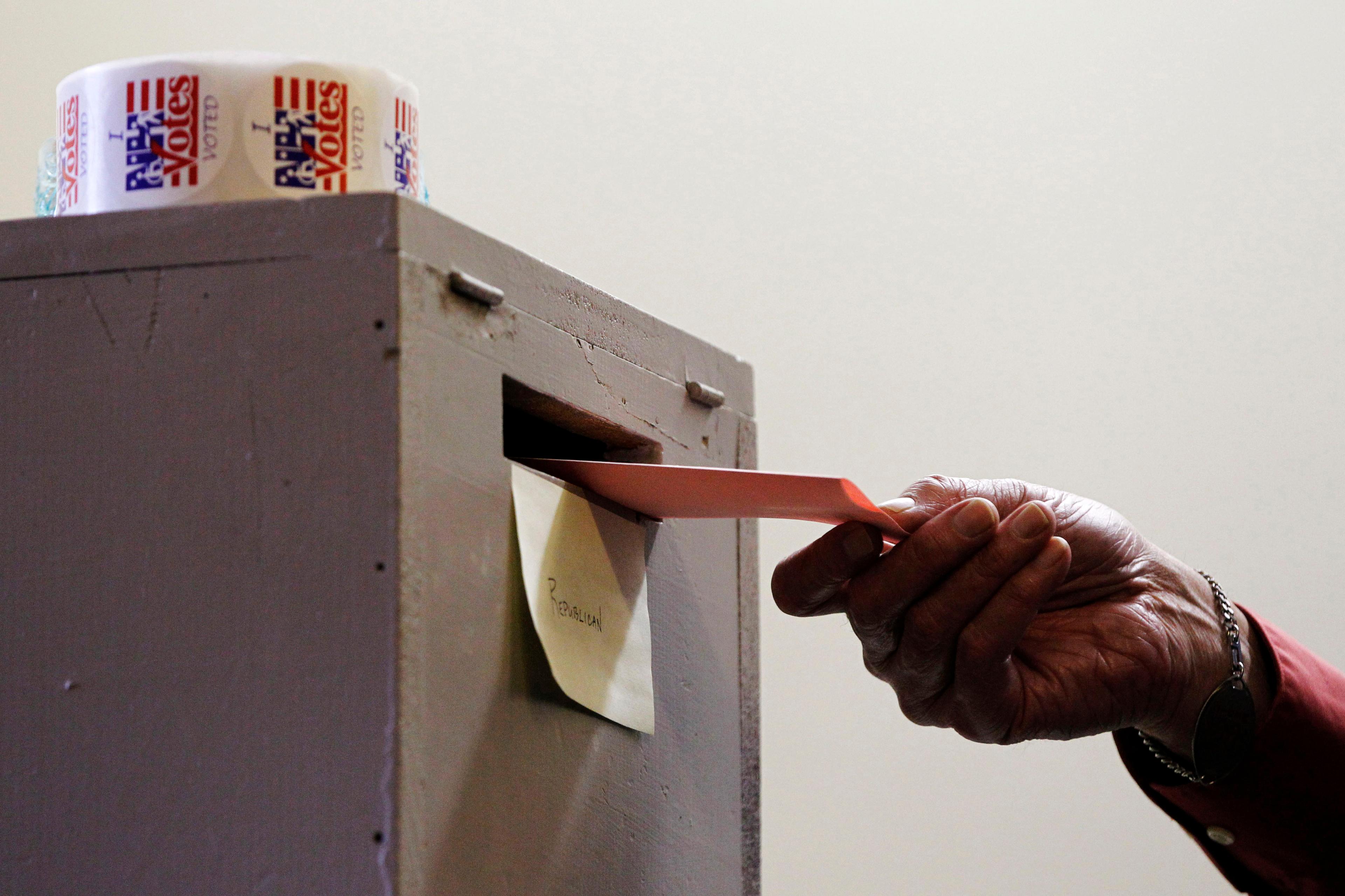 Photo: Casting ballot in 2012 primary (AP Photo)
