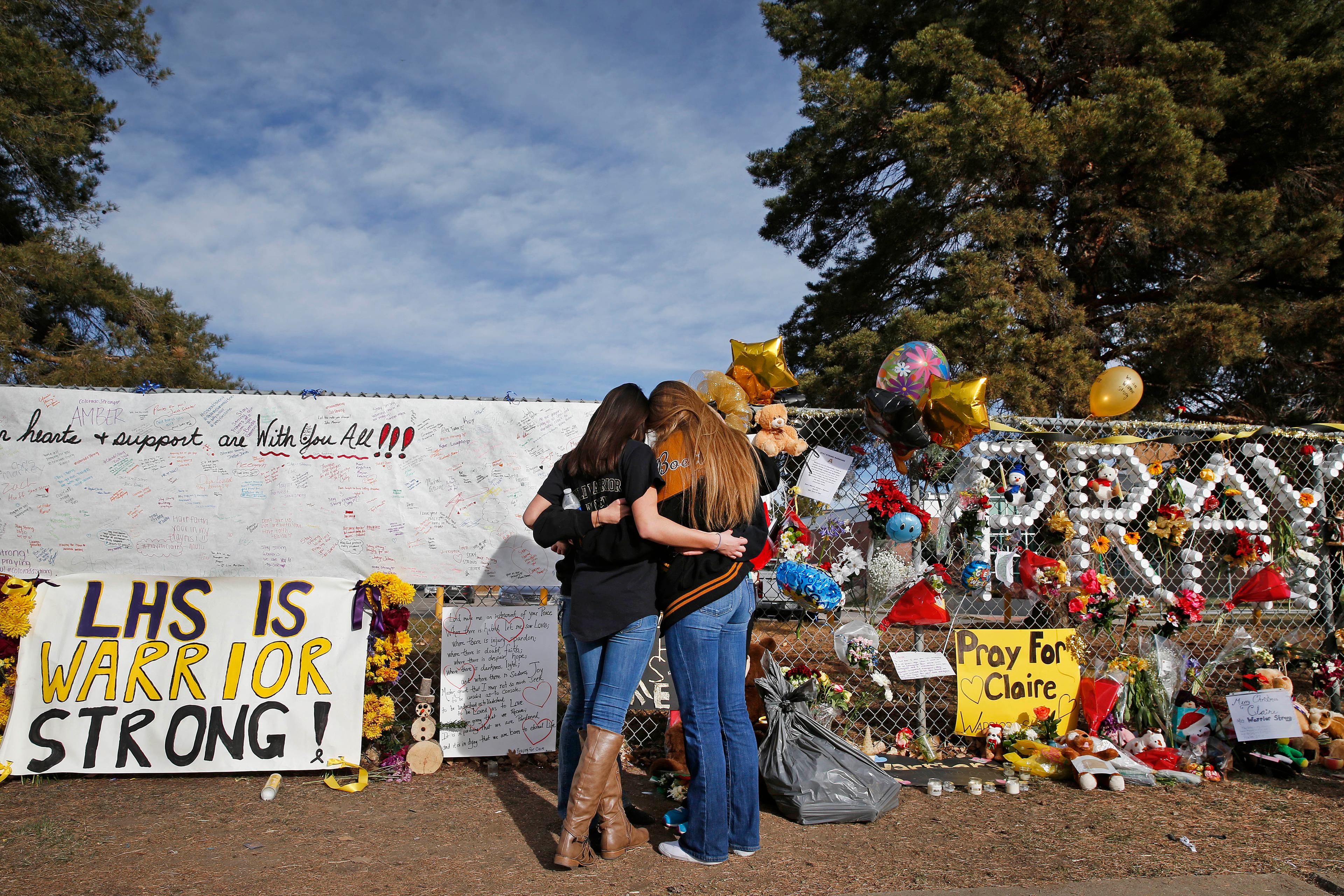 Photo: Arapahoe High School memorial (AP Photo)