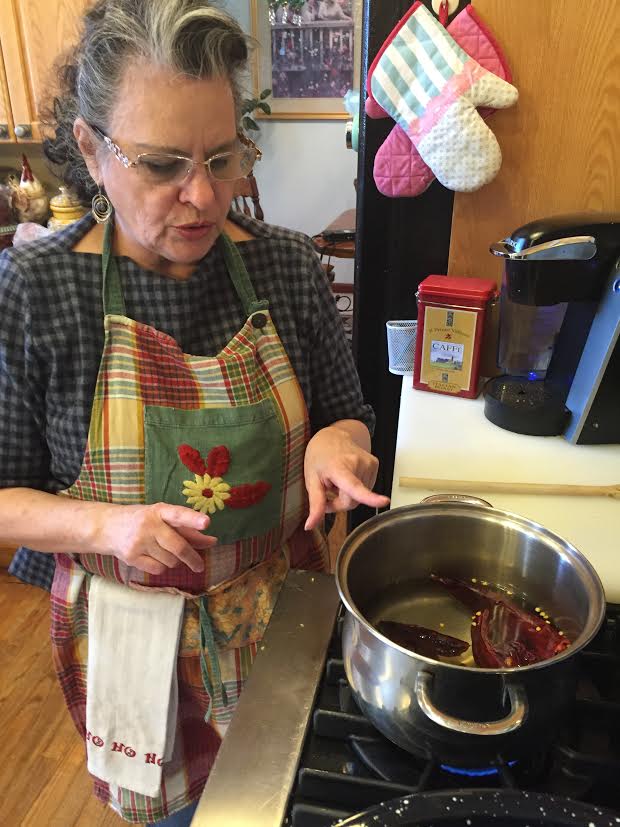 Photo: Becky Vasquez prepares tamales (Staff)