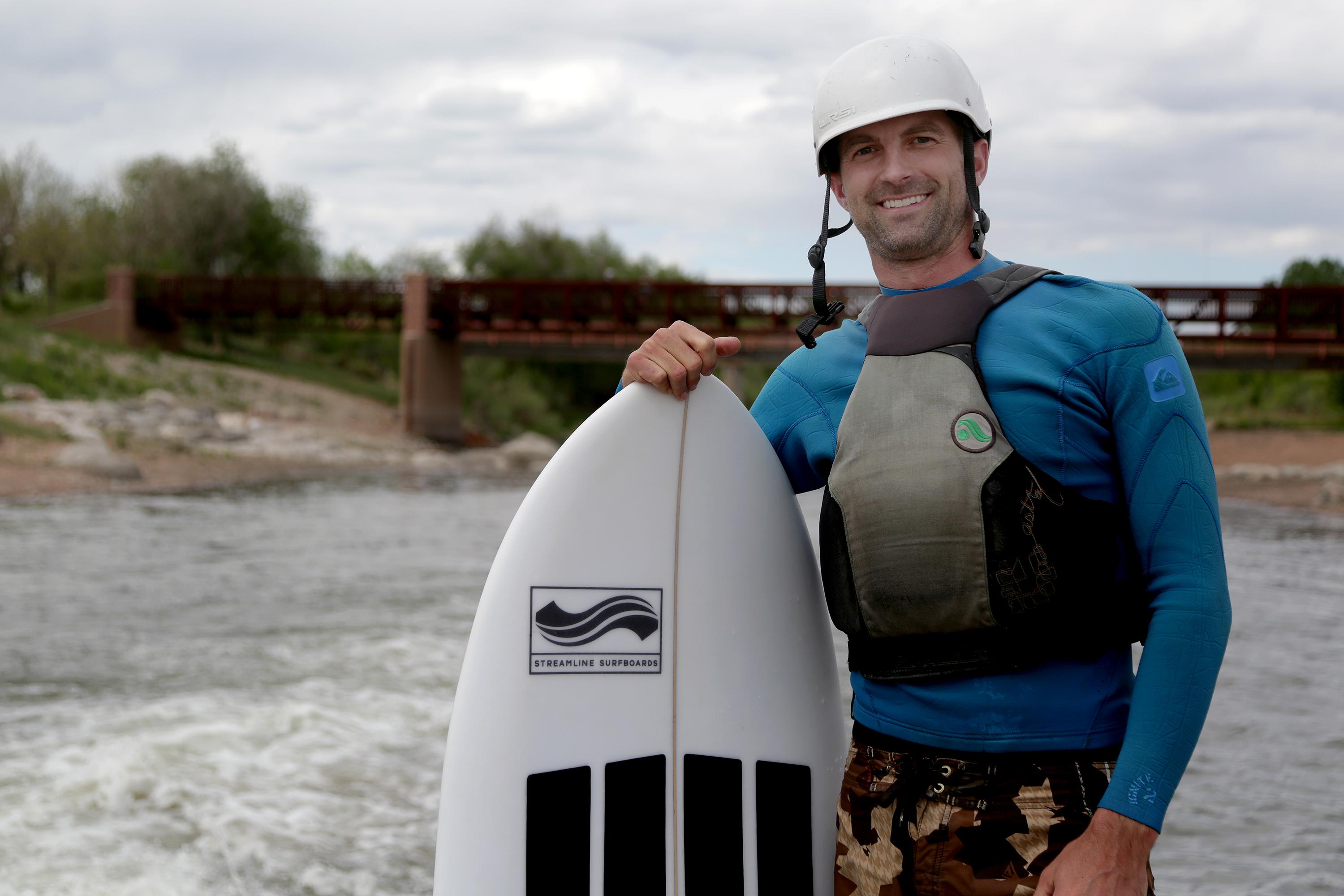 Photo: Ben Nielsen And His Surfboard Beside The South Platte