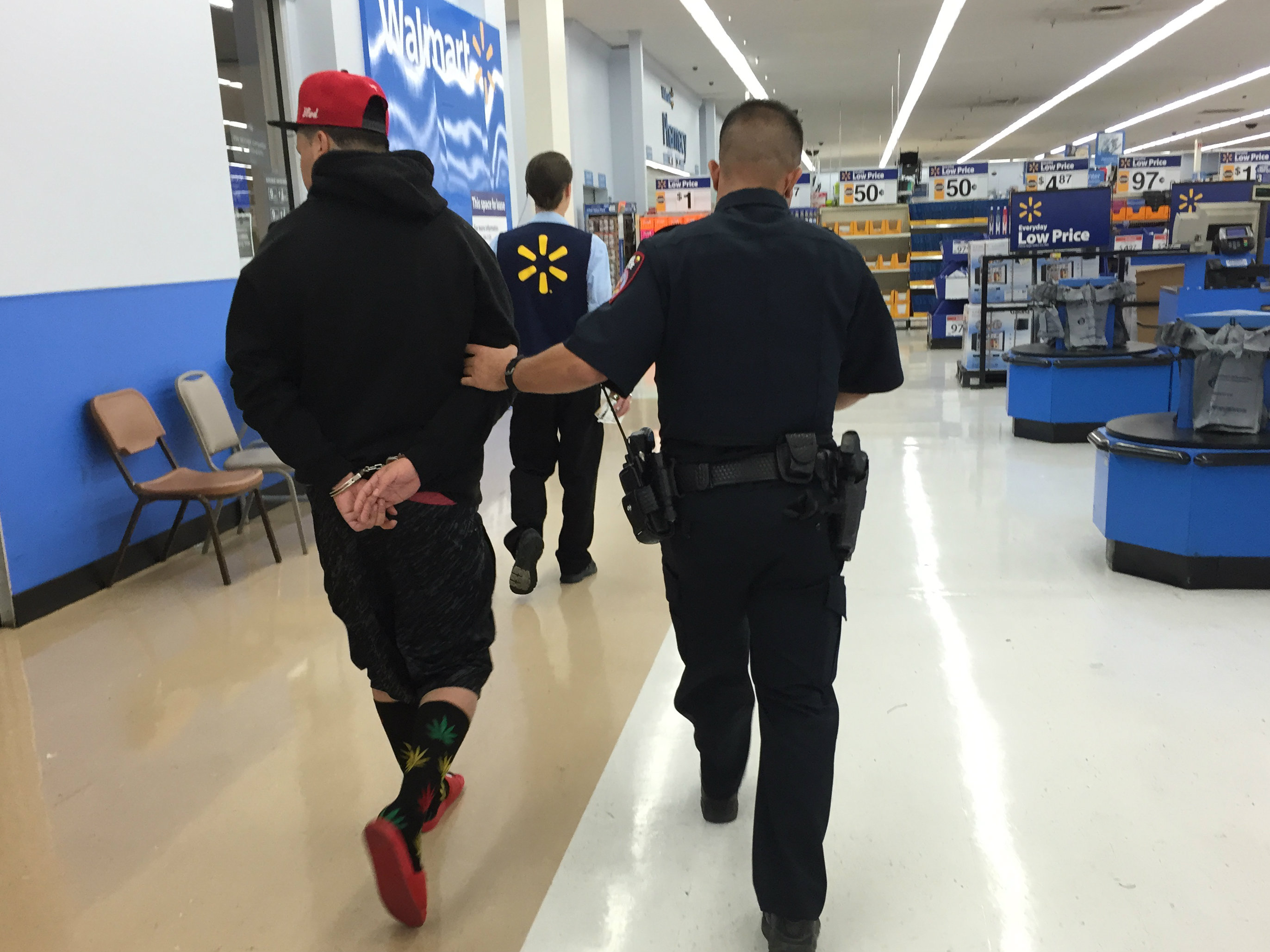Photo: Body cameras in Pueblo Castro escorting Walmart suspect