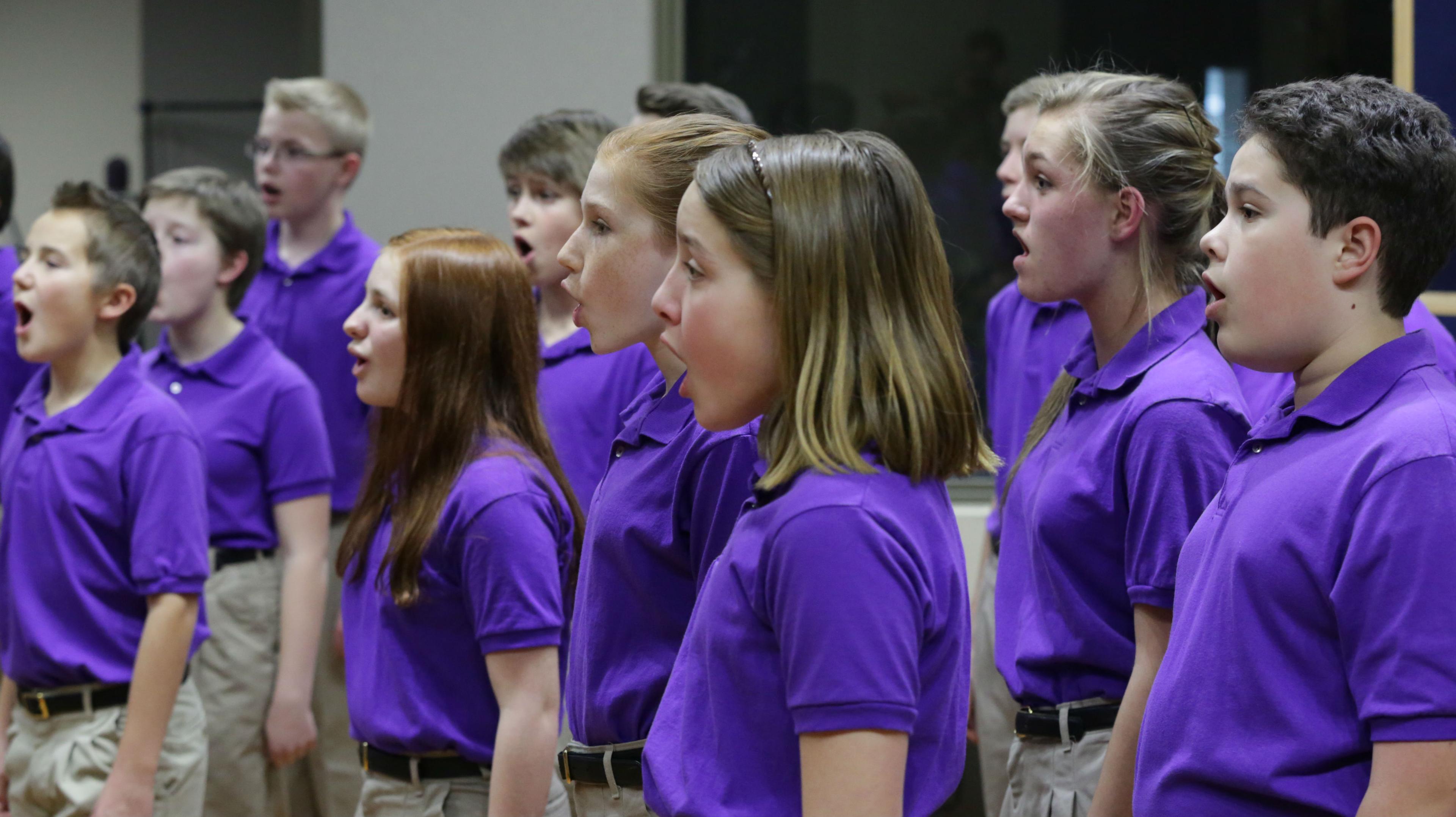 Photo: CCC sings national anthems