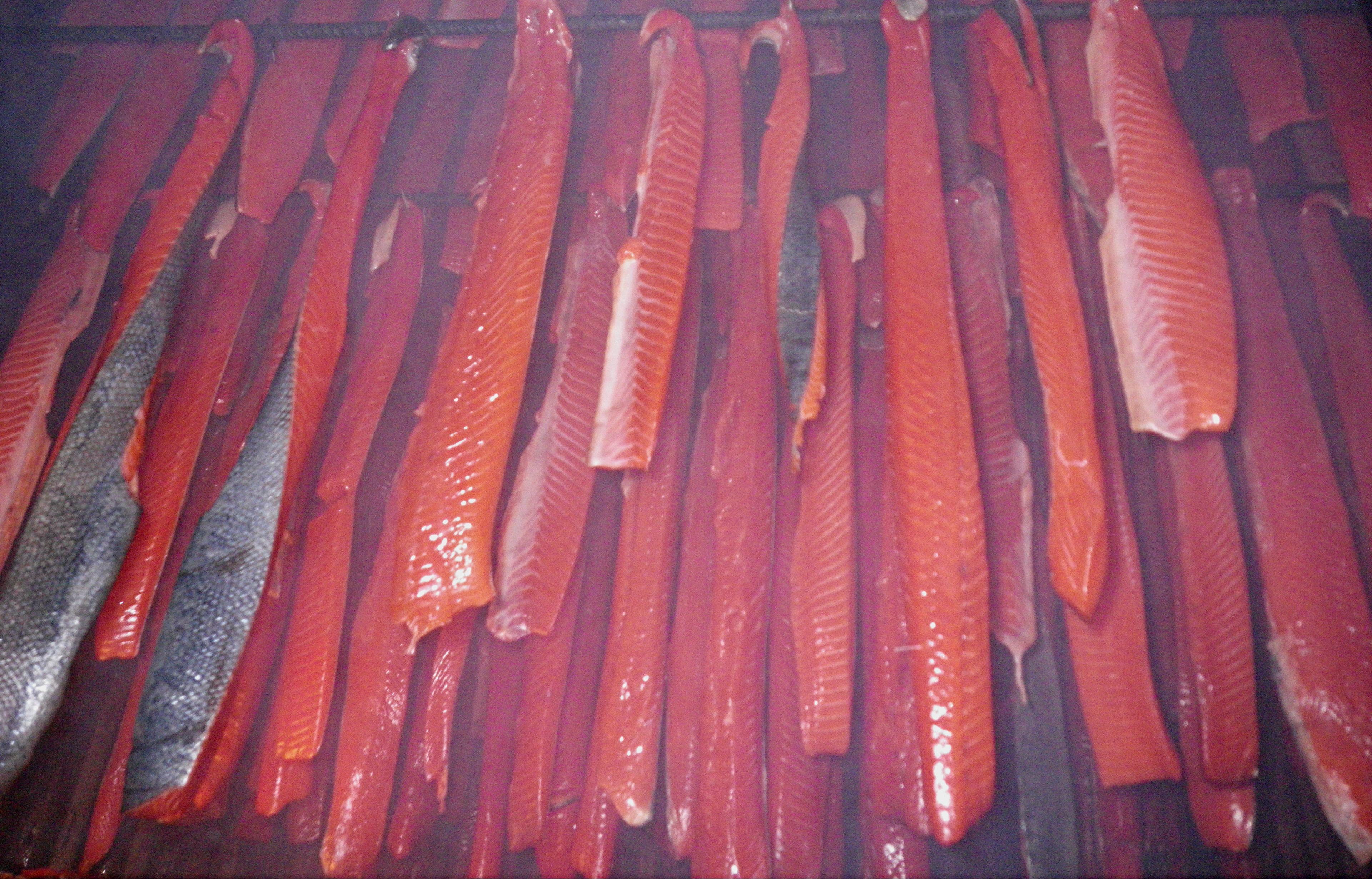 Photo: Salmon in a smokehouse