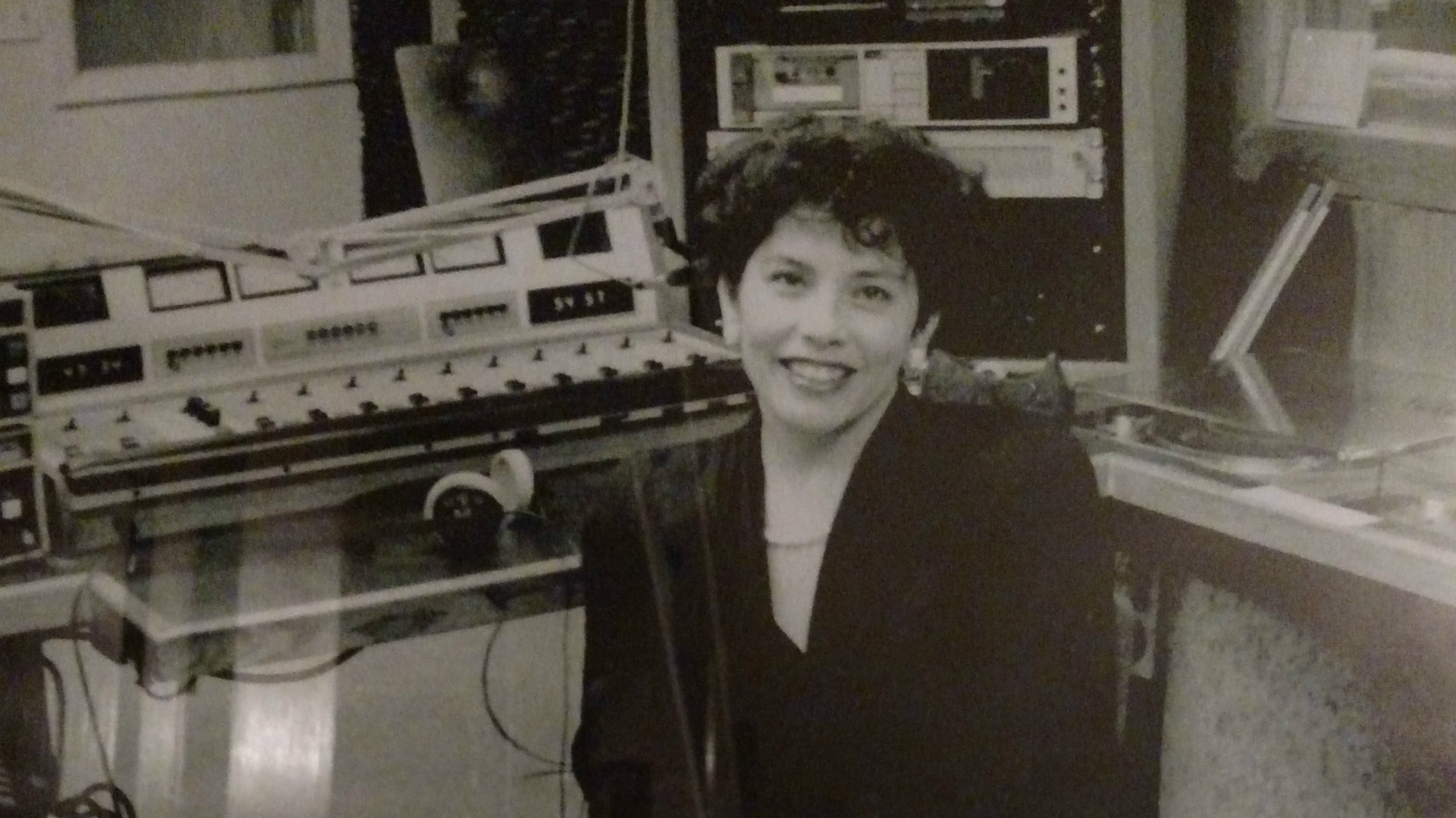 Photo: KUVO founder Florence Hernandez Ramos in a 1980s radio studio CROPPED