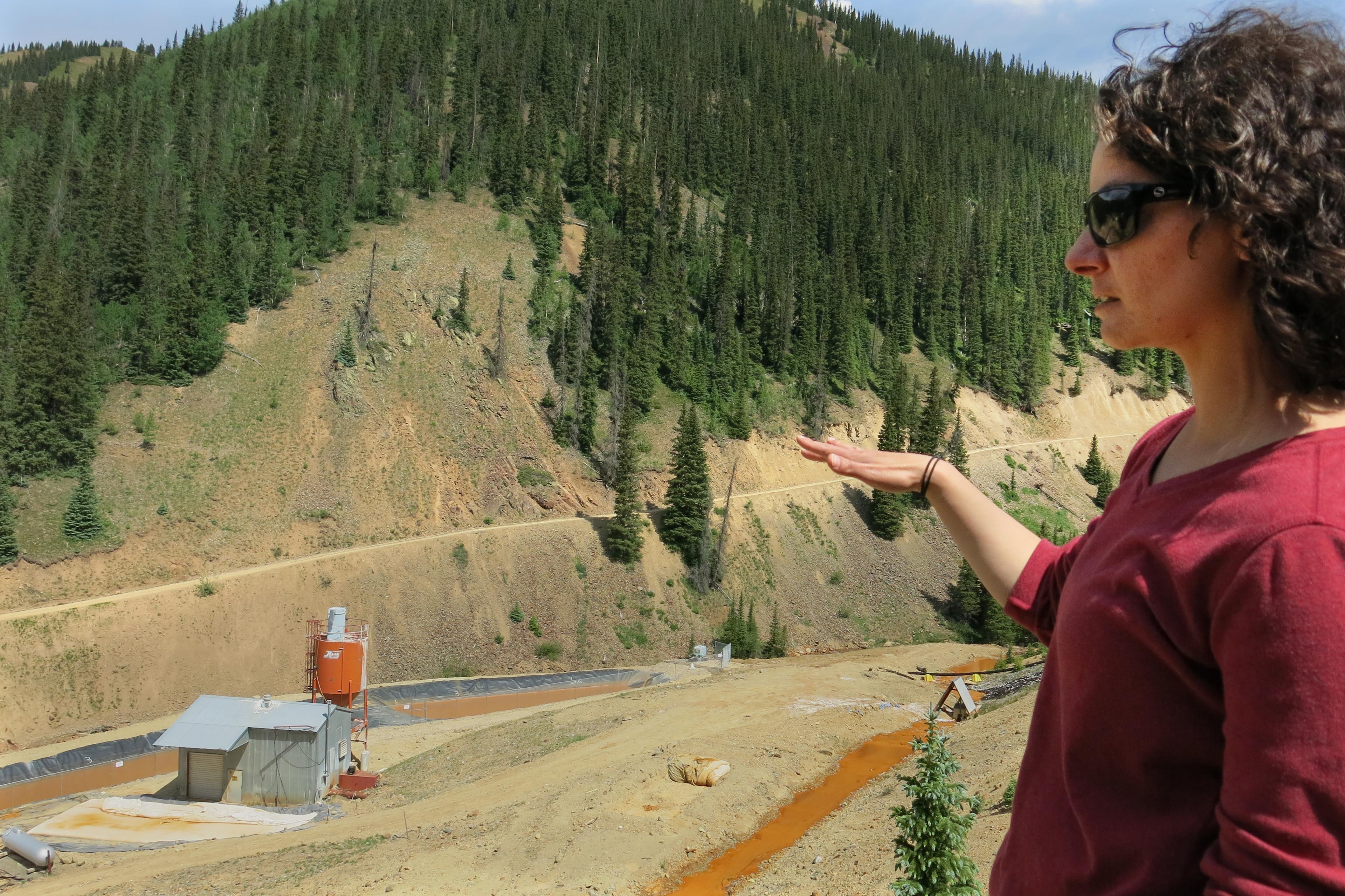 Photo: Gold King Mine 1 Year Later Workers Clean Pipes EPA on-scene coordinator Joyel Dhieux