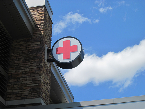 Photo: Hospital sign and wellness symbol (stock)