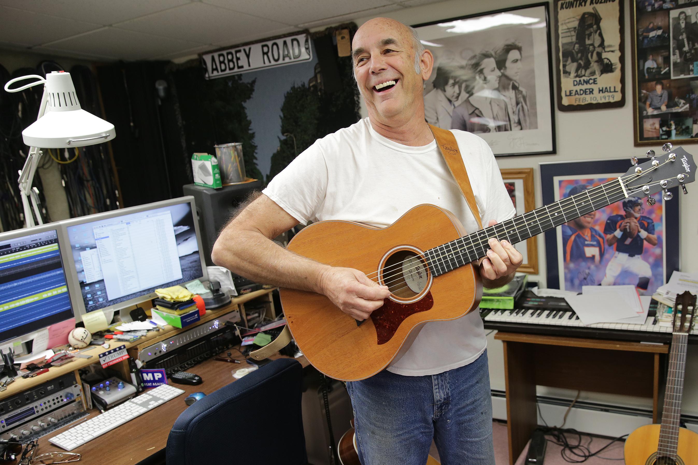 Photo: Carl Dutro Playing Guitar