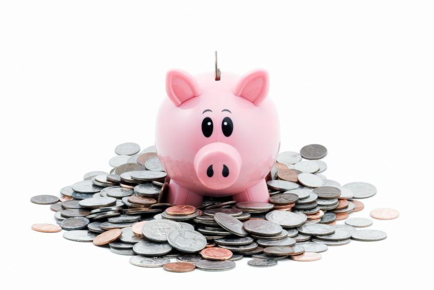 Photo: Piggy bank and coins