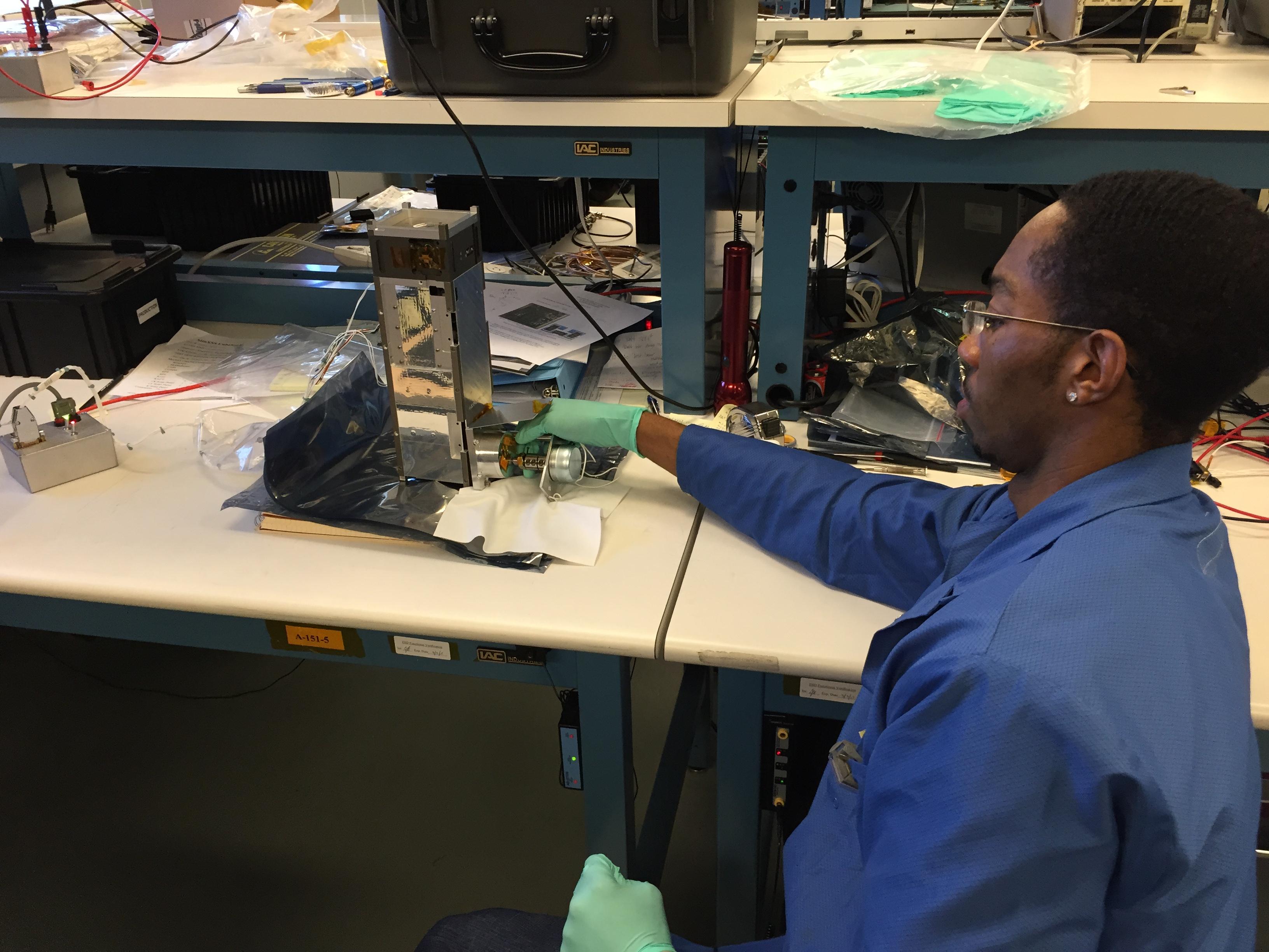 Photo: CubeSat construction by CU Grad student