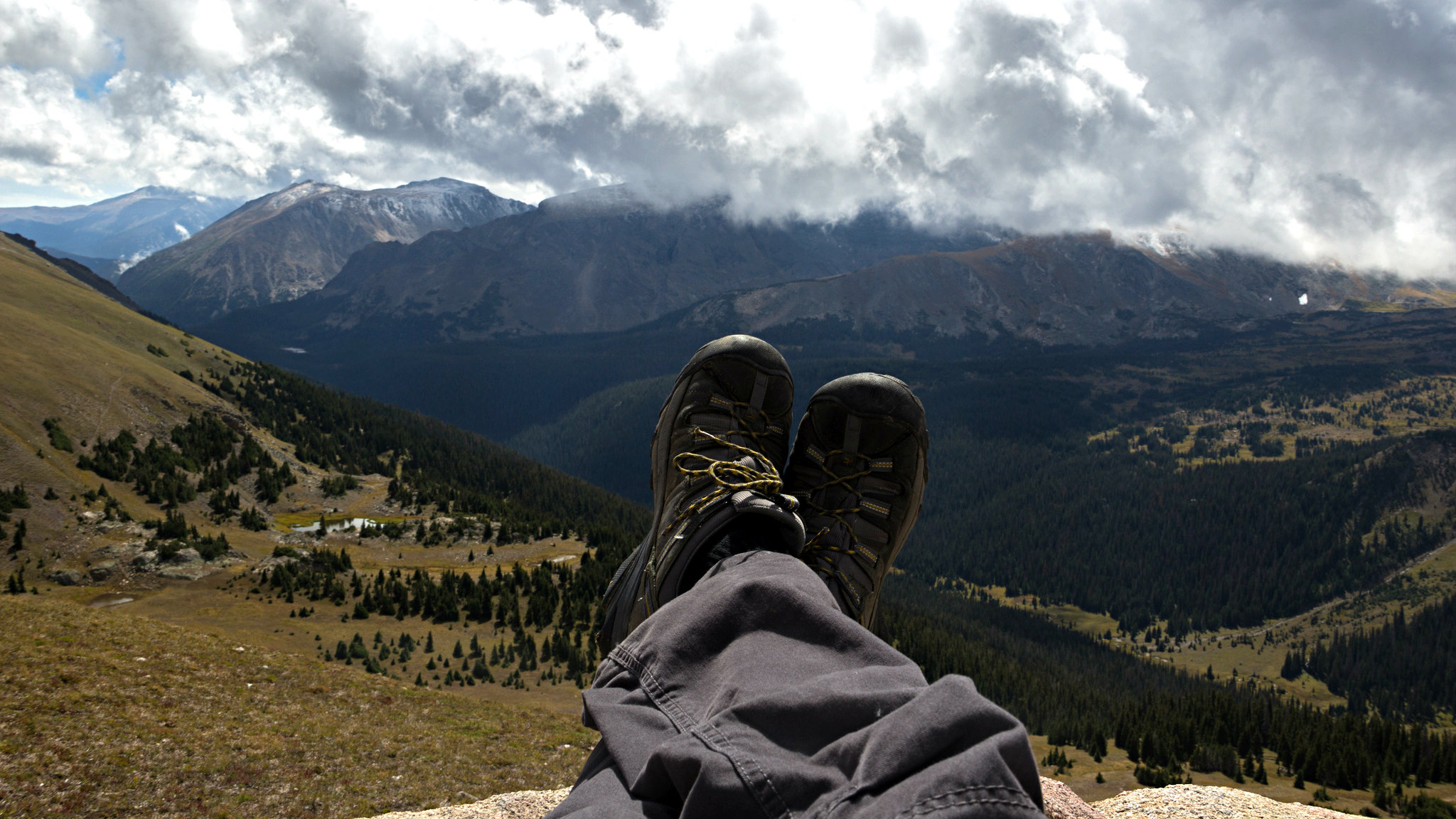 Photo: Stock image of hiking boots on a mountain