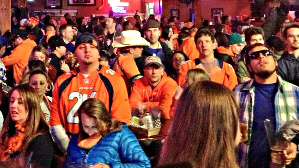 Photo: Denver Broncos fans watching the Super Bowl