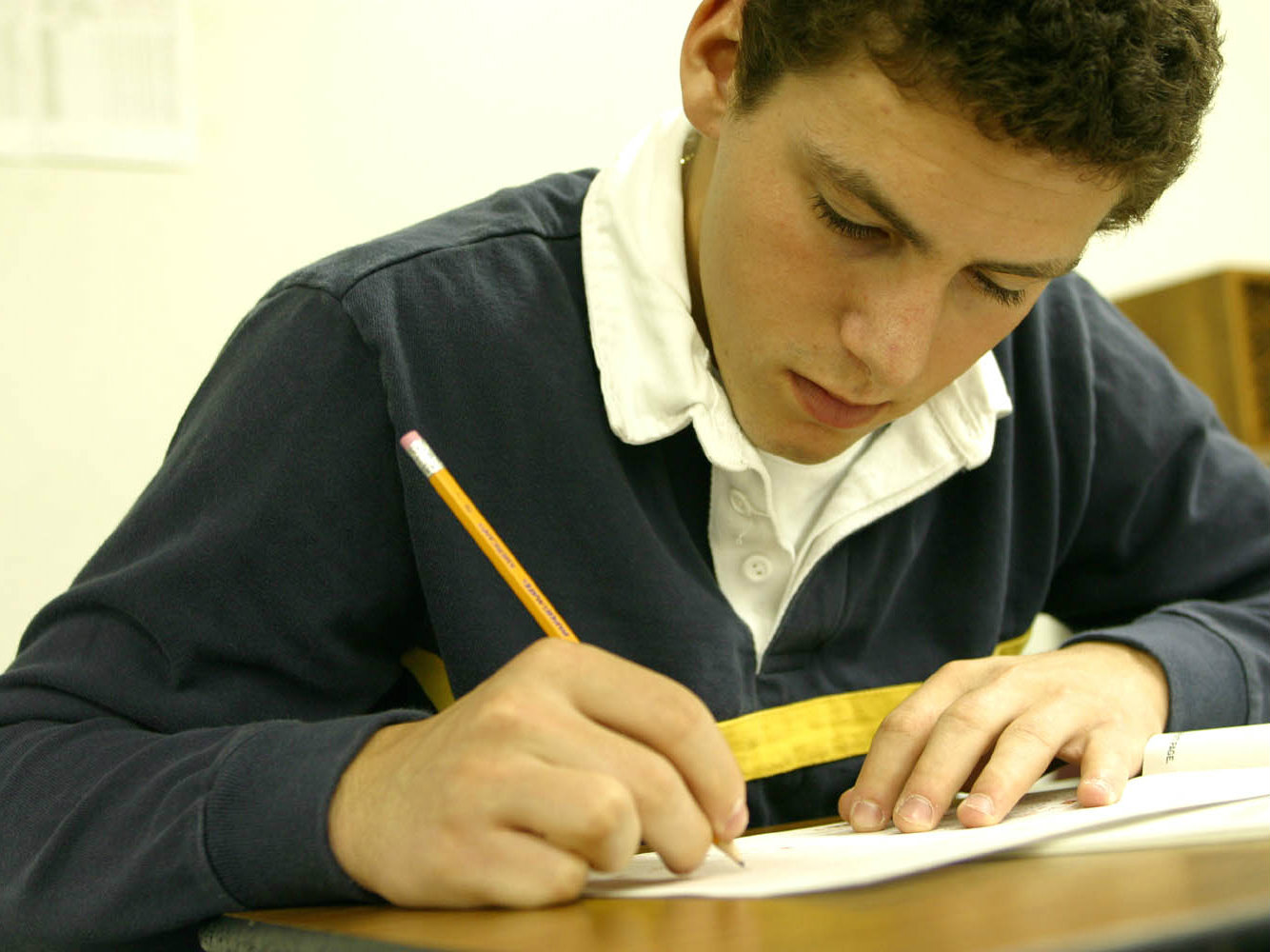 Photo: testing (AC high school boy taking test)