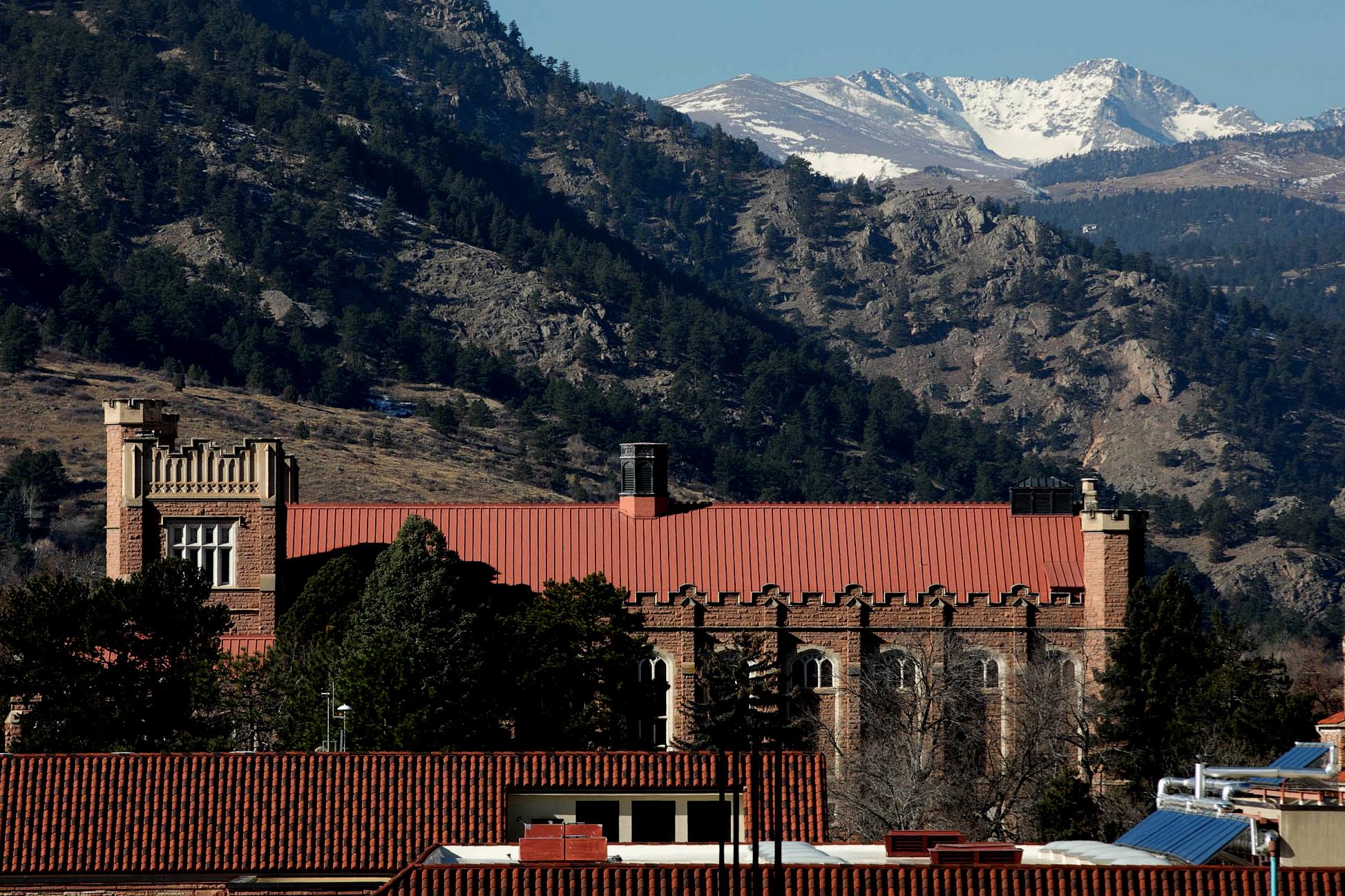 Mackey Auditorium&#039;s red tile roof on the CU Boulder campus