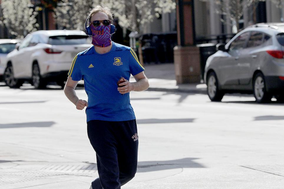 Runner Wearing Mask In LoDo