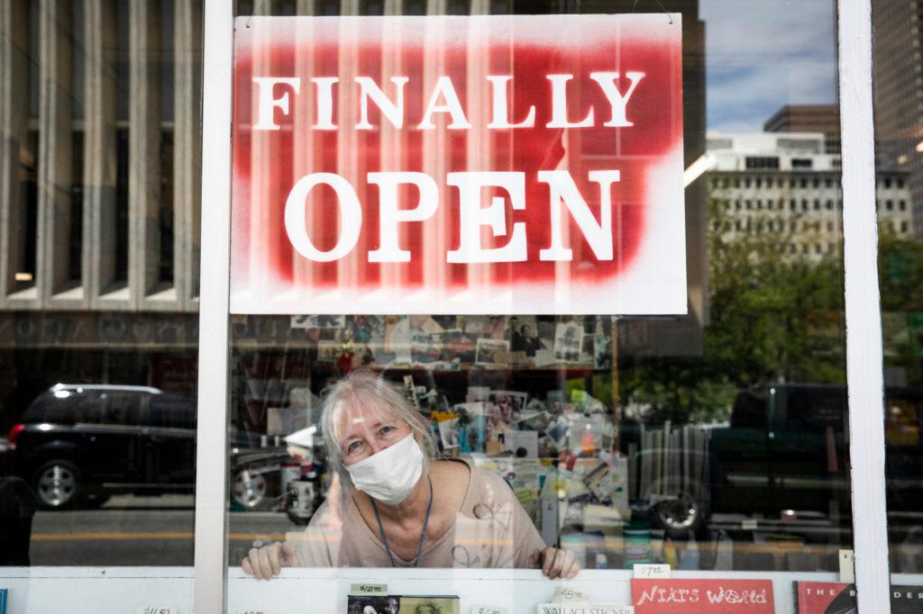 Capitol Hill Books owner Holly Brooks in her reopened store on Colfax Avenue