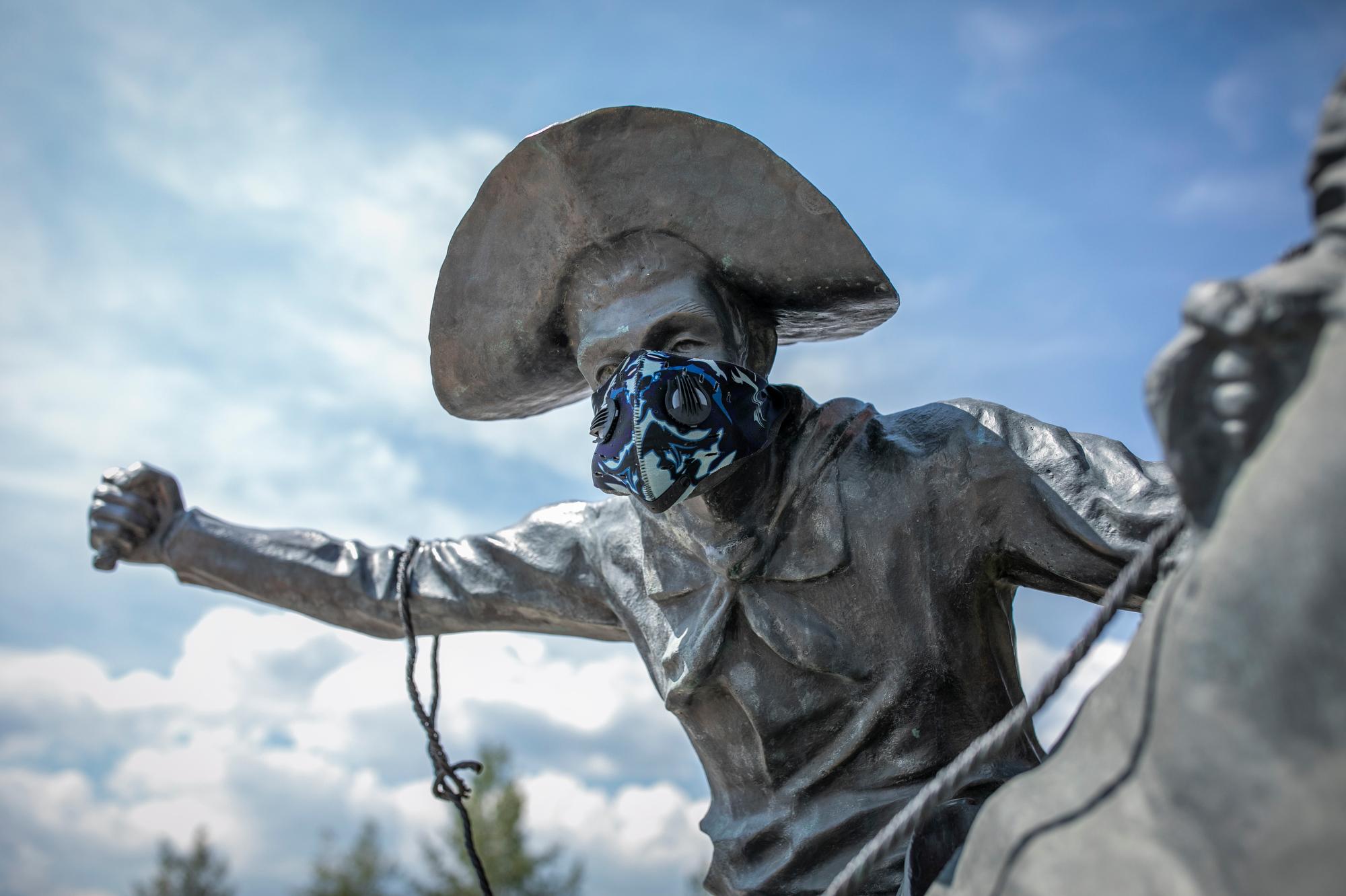 WINTER PARK MASK COWBOY STATUE