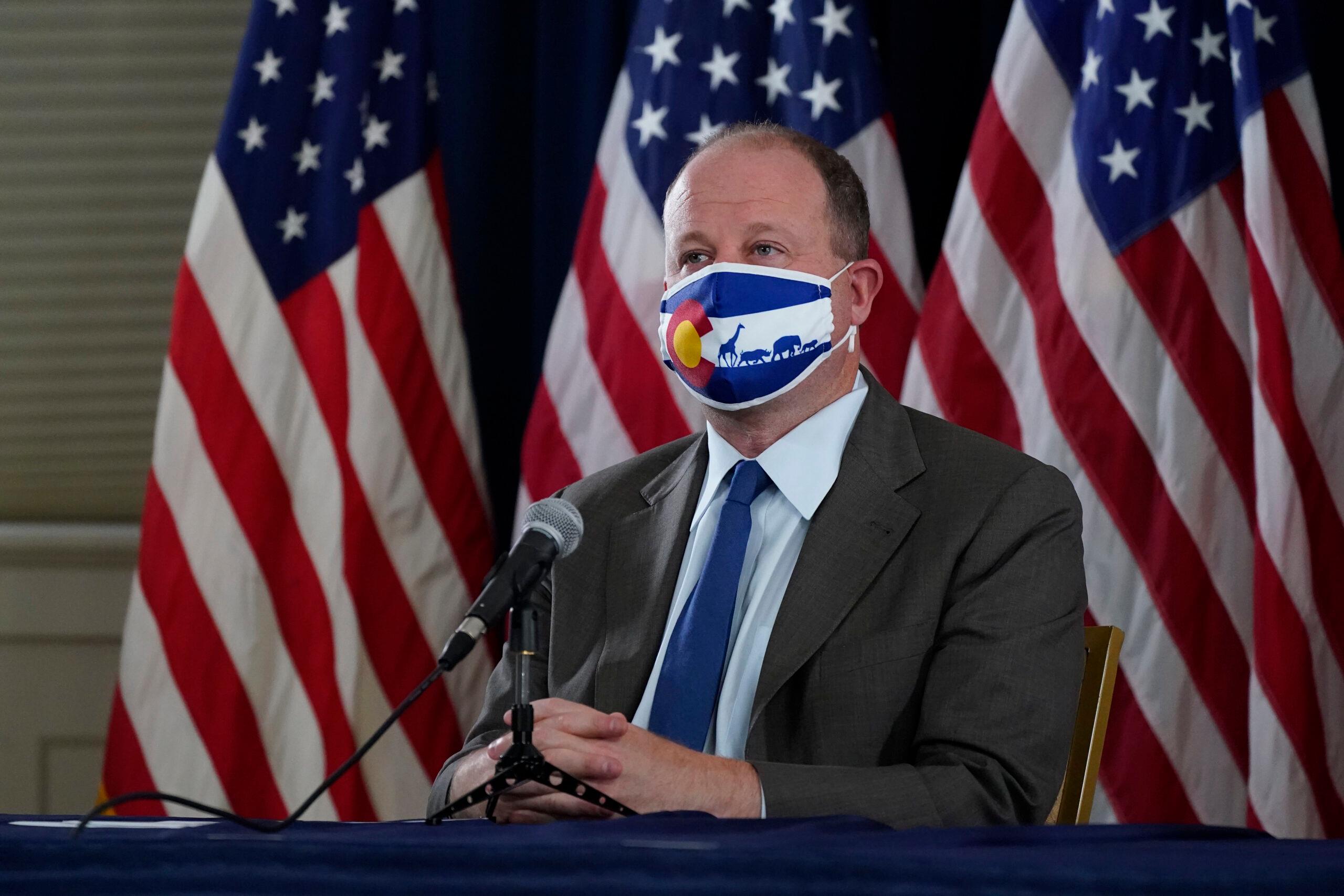 Colorado Gov. Jared Polis in a face mask.