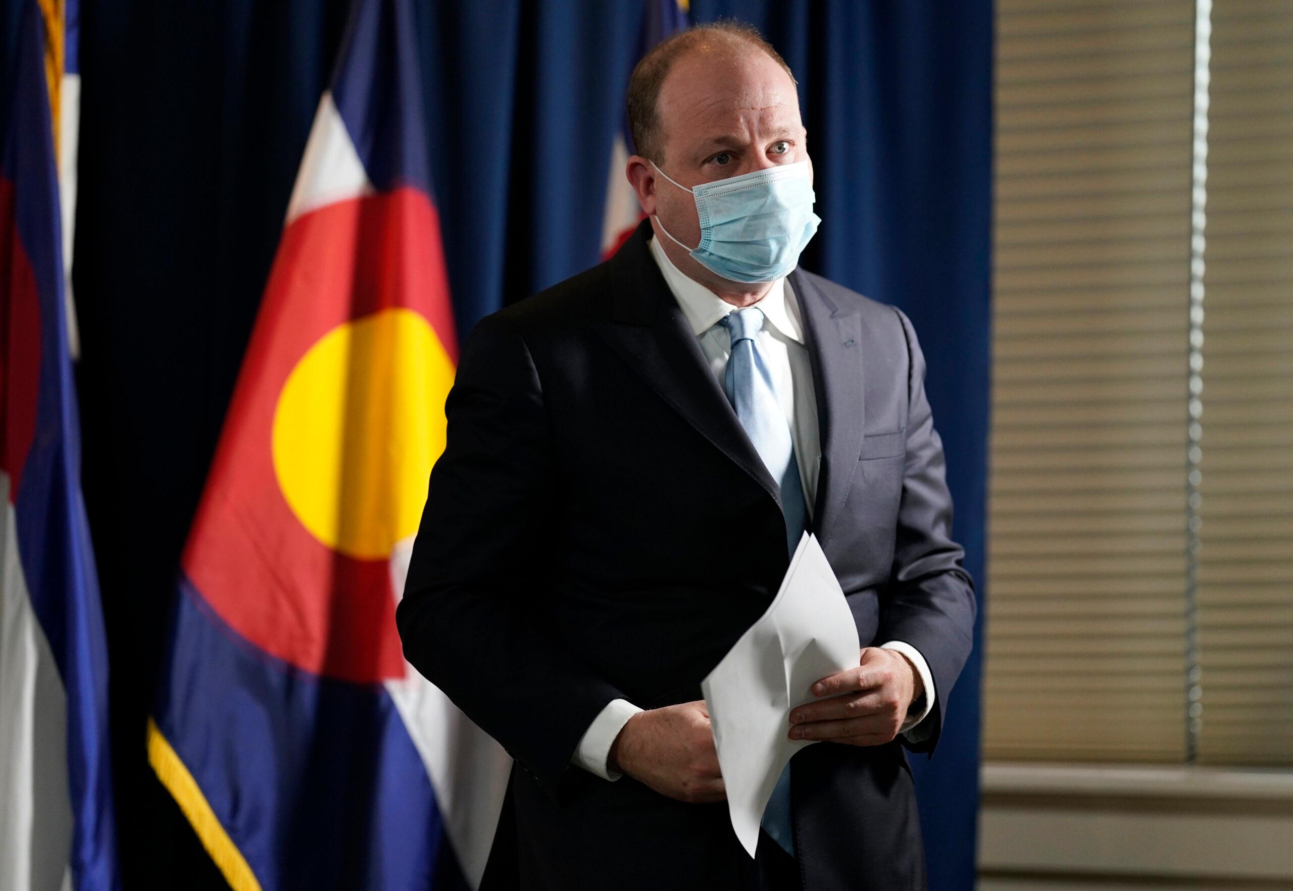 Gov. Jared Polis in a face mask.