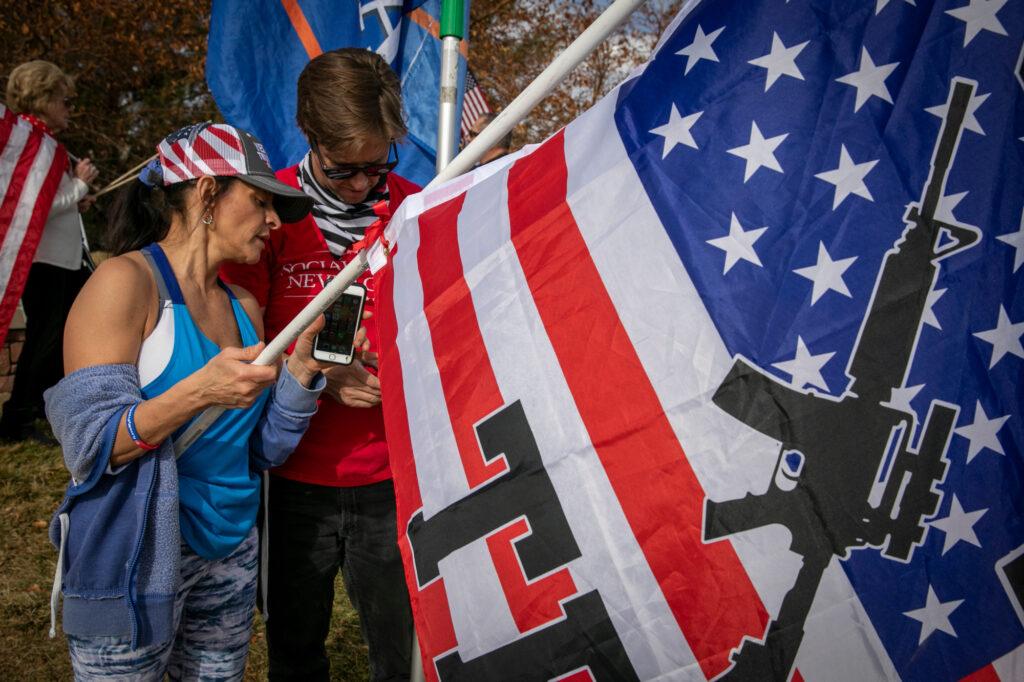 ELECTION-DAY-HIGHLANDS-RANCH-GUN-ON-FLAG