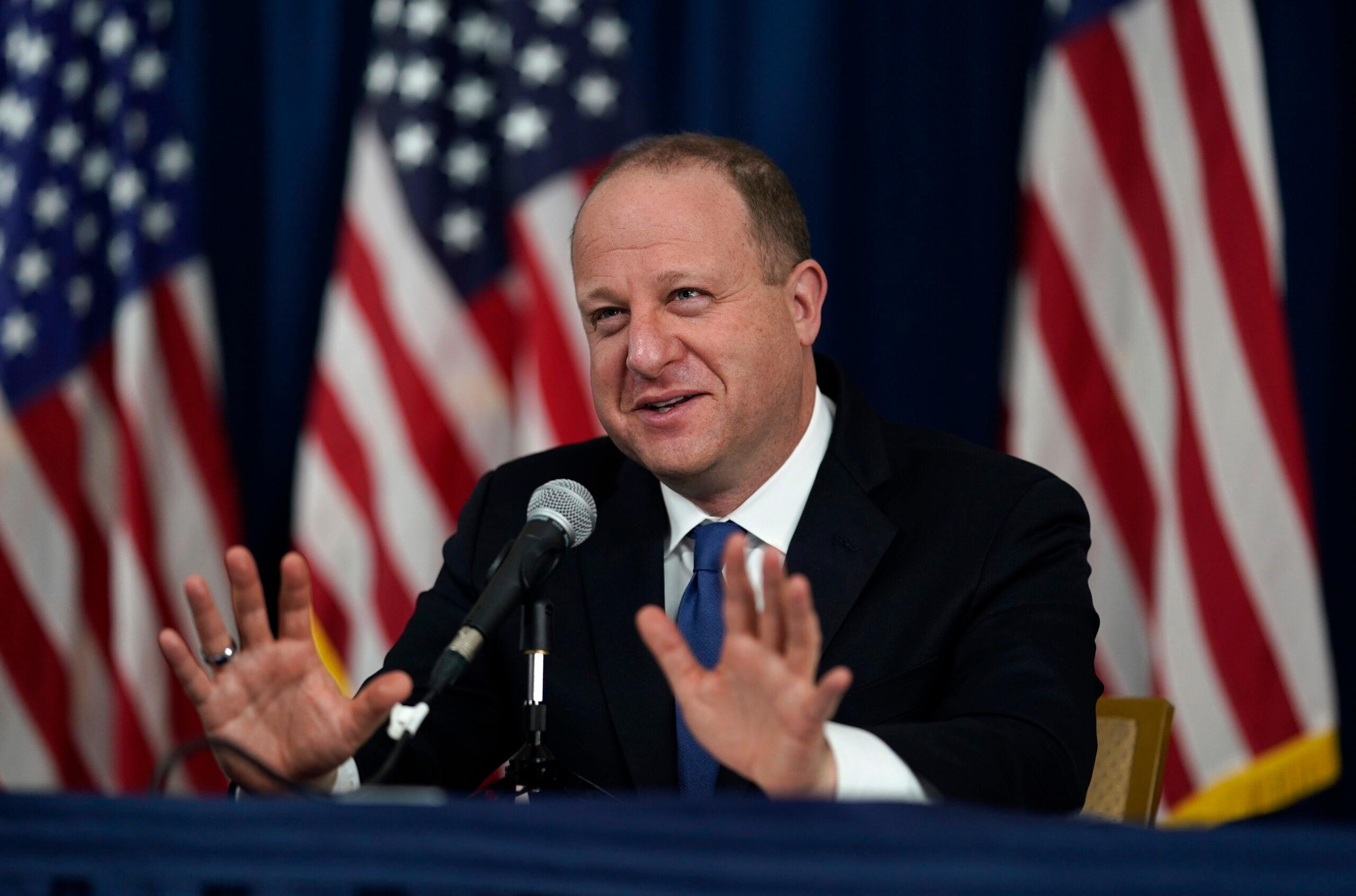 Gov. Jared Polis makes a point