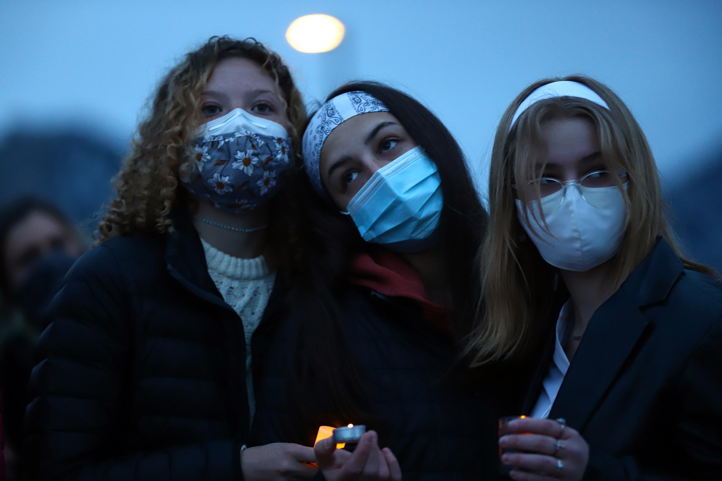 King Soopers shooting vigil Boulder 210325 mourners