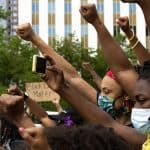 Elisabeth Epps leads a crowd on the Capitol steps on the sixth day of protests in reaction to the killing of George Floyd by Minneapolis police. June 2, 2020. (Kevin J. Beaty/Denverite)
