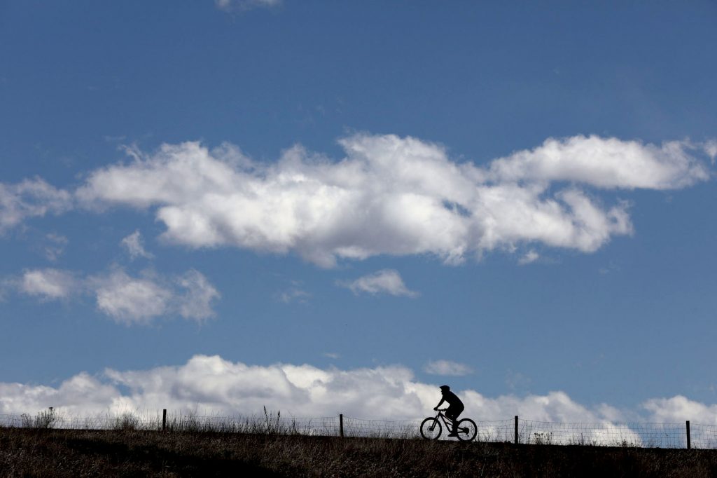 Lone Cyclist Green Mountain at Hayden Park in Jefferson County