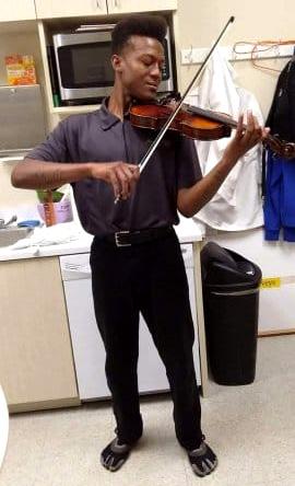 Elijah McClain plays the violin.