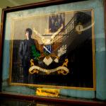 Philip Beaver's infantry colors were framed and hung in his office at the Pentagon when a plane struck the building on Sept. 11, 2001. He still has the frame, uncleaned after smoke and water marred it that day. Sept. 7, 2021.