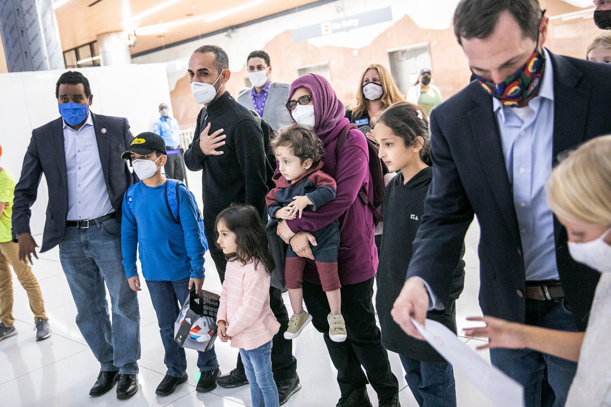 211005-SIDDIQI-AFGHAN-TRANSLATOR-FAMILY-ARRIVES-DIA-0001