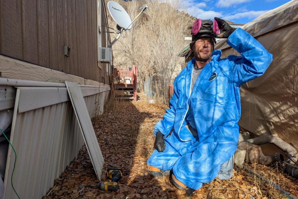 Neal Ashforth winterizing a home in Eagle County.