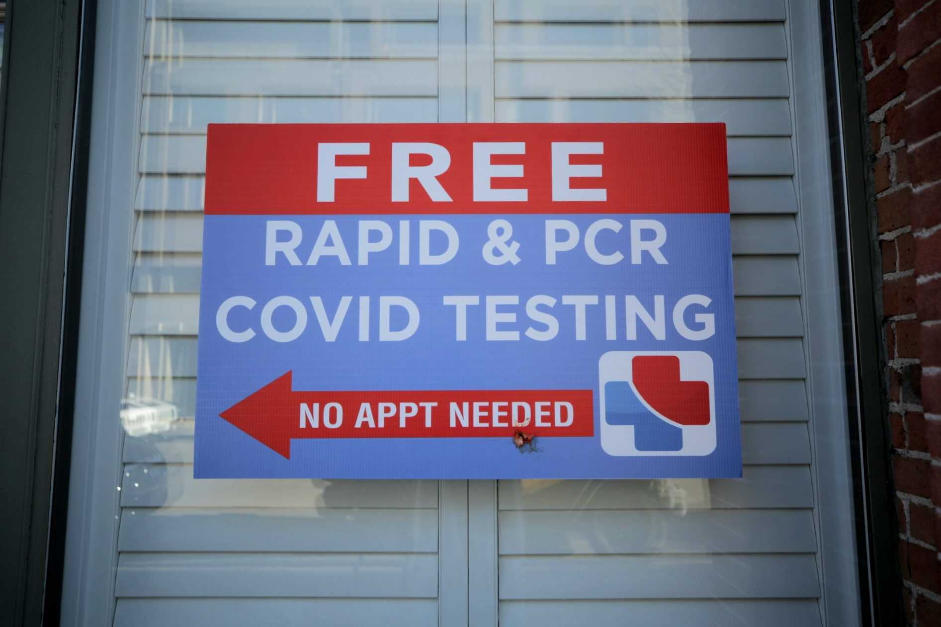 A sign advertising a free COVID test at the Center for COVID Control's location at 1750 Blake St. in Denver on January 15, 2022.