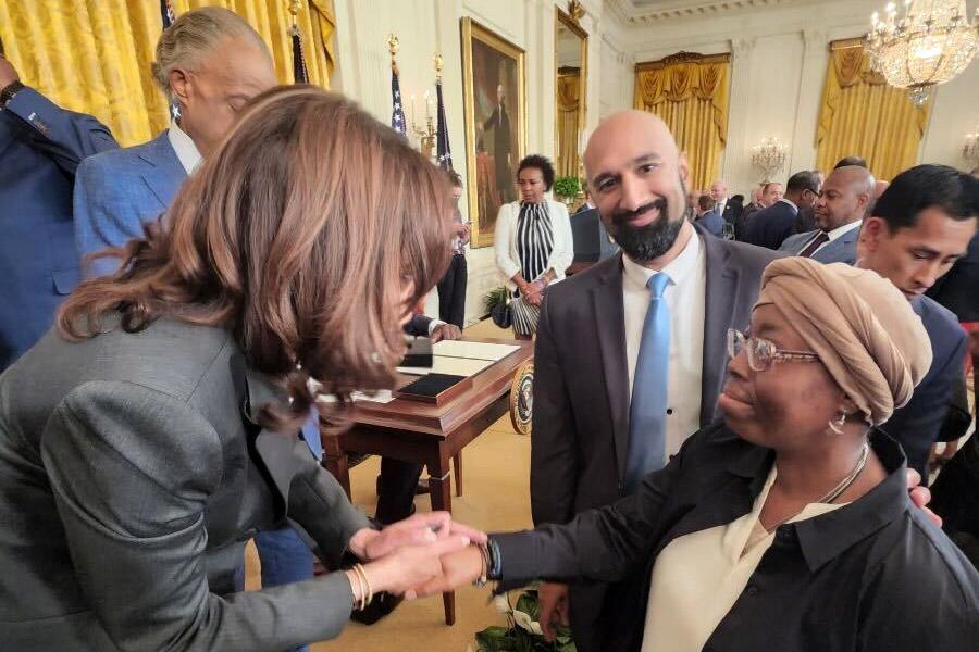 Sheneen McClain shakes hands with Vice President Kamala Harris on Wednesday, May 25, 2022. McClain was in Washington, D.C., to attend President Joe Biden's signing of an executive order on police reform. McClain's son, Elijah, died after being violently arrested and given ketamine in Aurora in 2019.