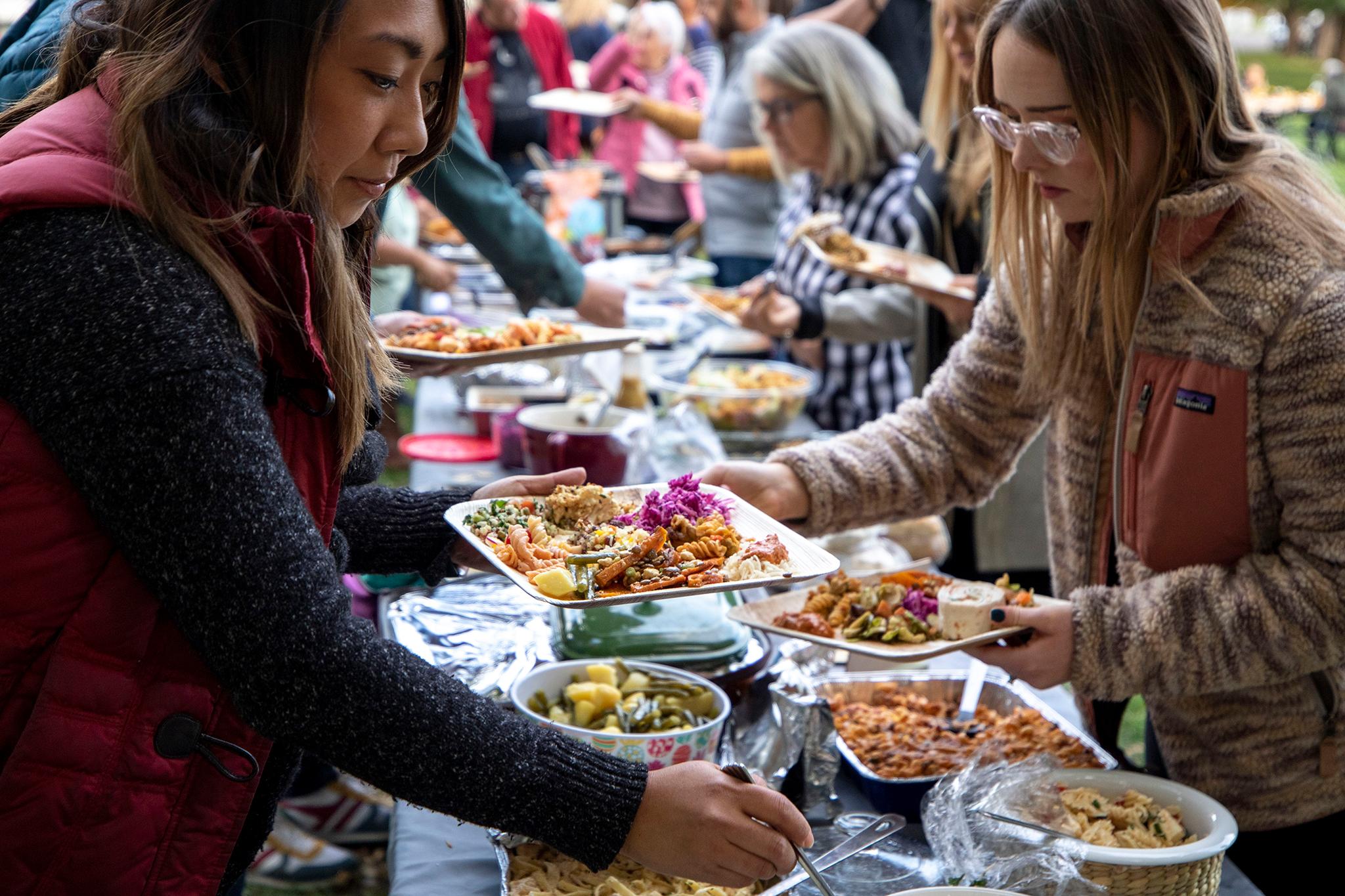 The buffet table at a long table dinner in City Park. Oct. 15, 2022.