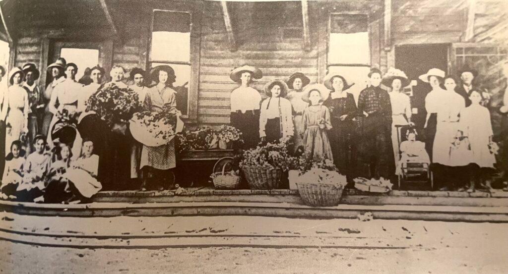 A group of flower pickers on a Memorial Day excursion to Carpenter, Colorado.