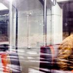 Ricci Autry closes his eyes as he rides an RTD W Line train before dawn. Feb. 22, 2023.