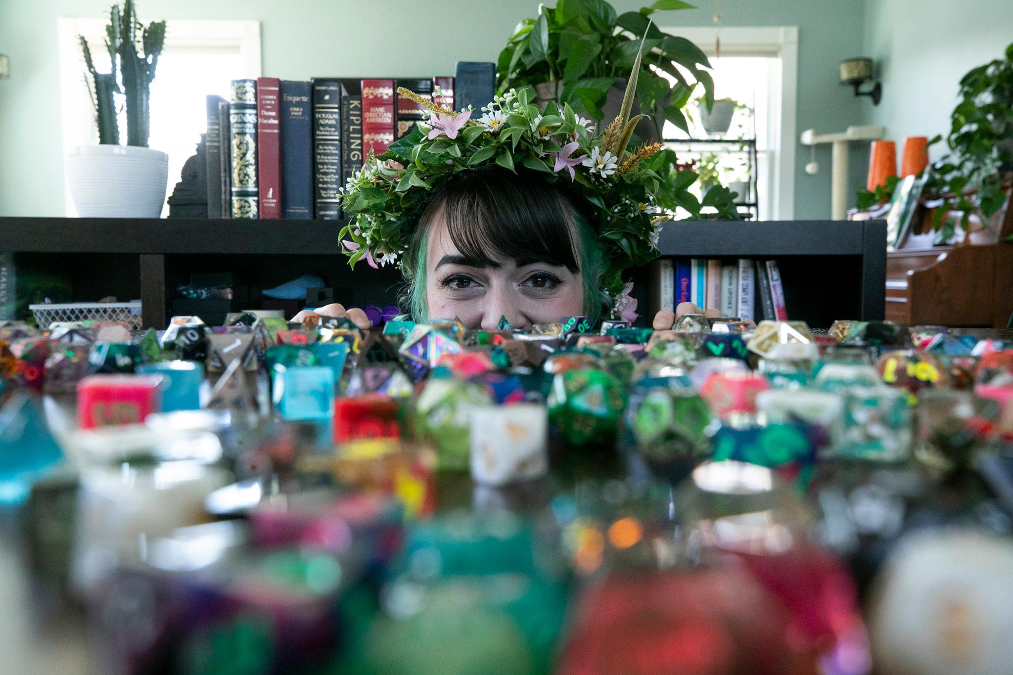 Ginny Di and a ton of gaming dice in her Denver home. May 3, 2023.
